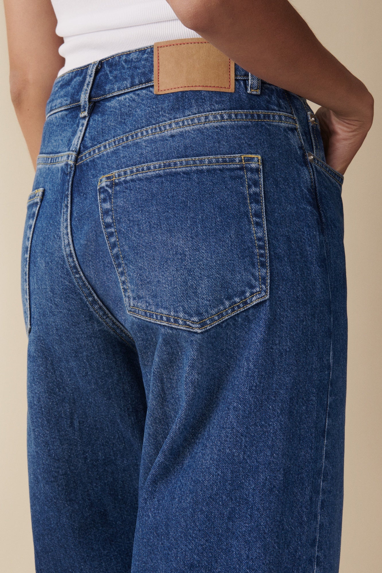 back image of a model wearing the Jeanerica Belem Jeans in Vintage 62