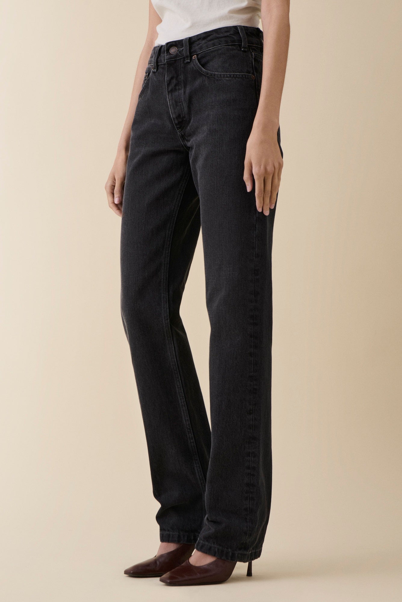 image of a model wearing the Jeanerica Sisli Jeans in Gesso Black