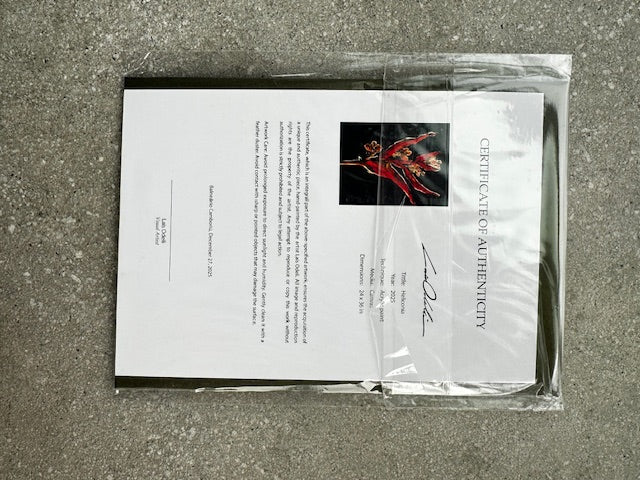 Certificate of Authenticity with artwork on a textured surface
