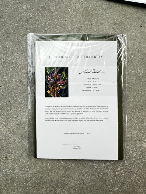 Document with a photograph and text on a gray surface