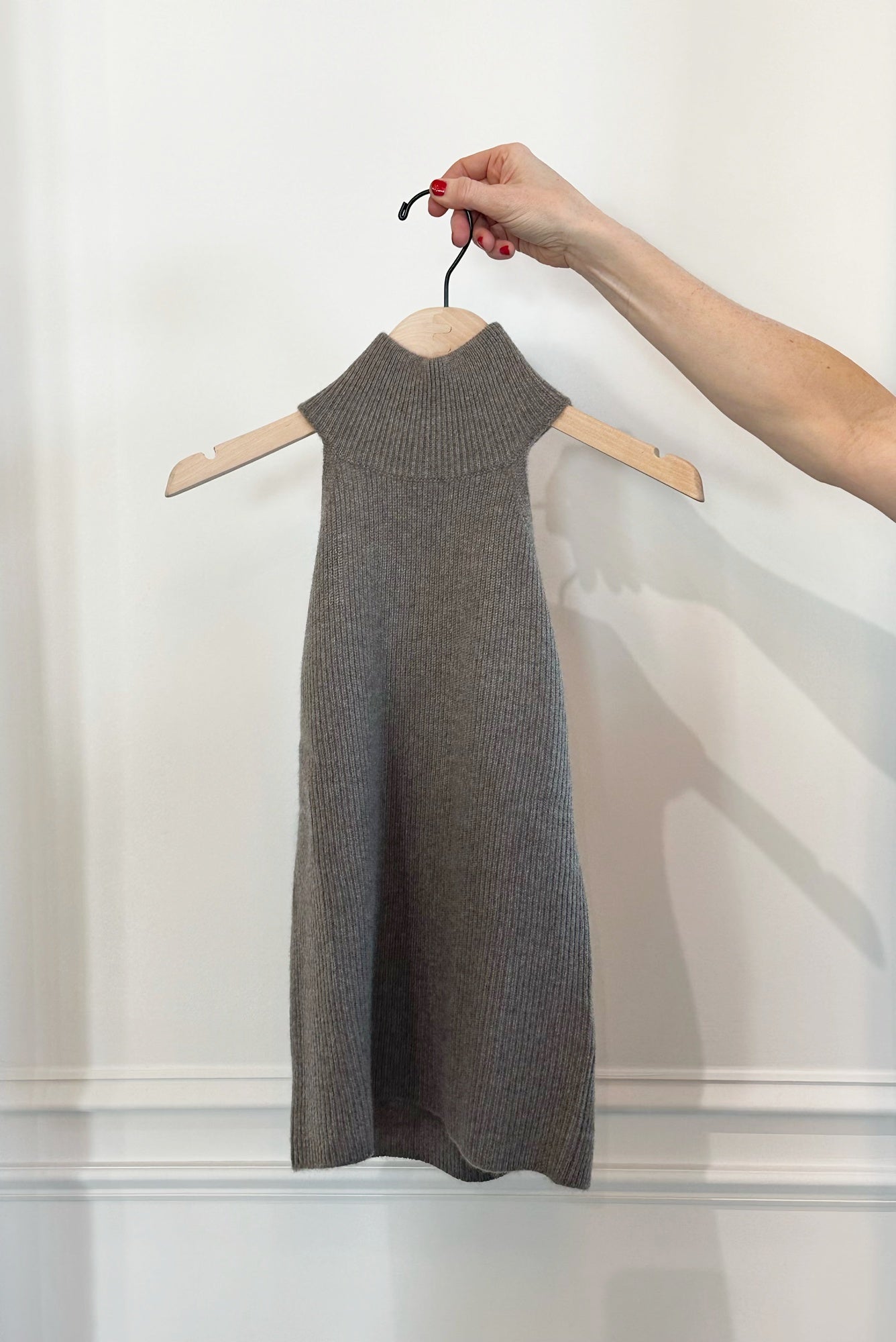 image of a woman holding the Lisa Yang Freya Tank in Truffle