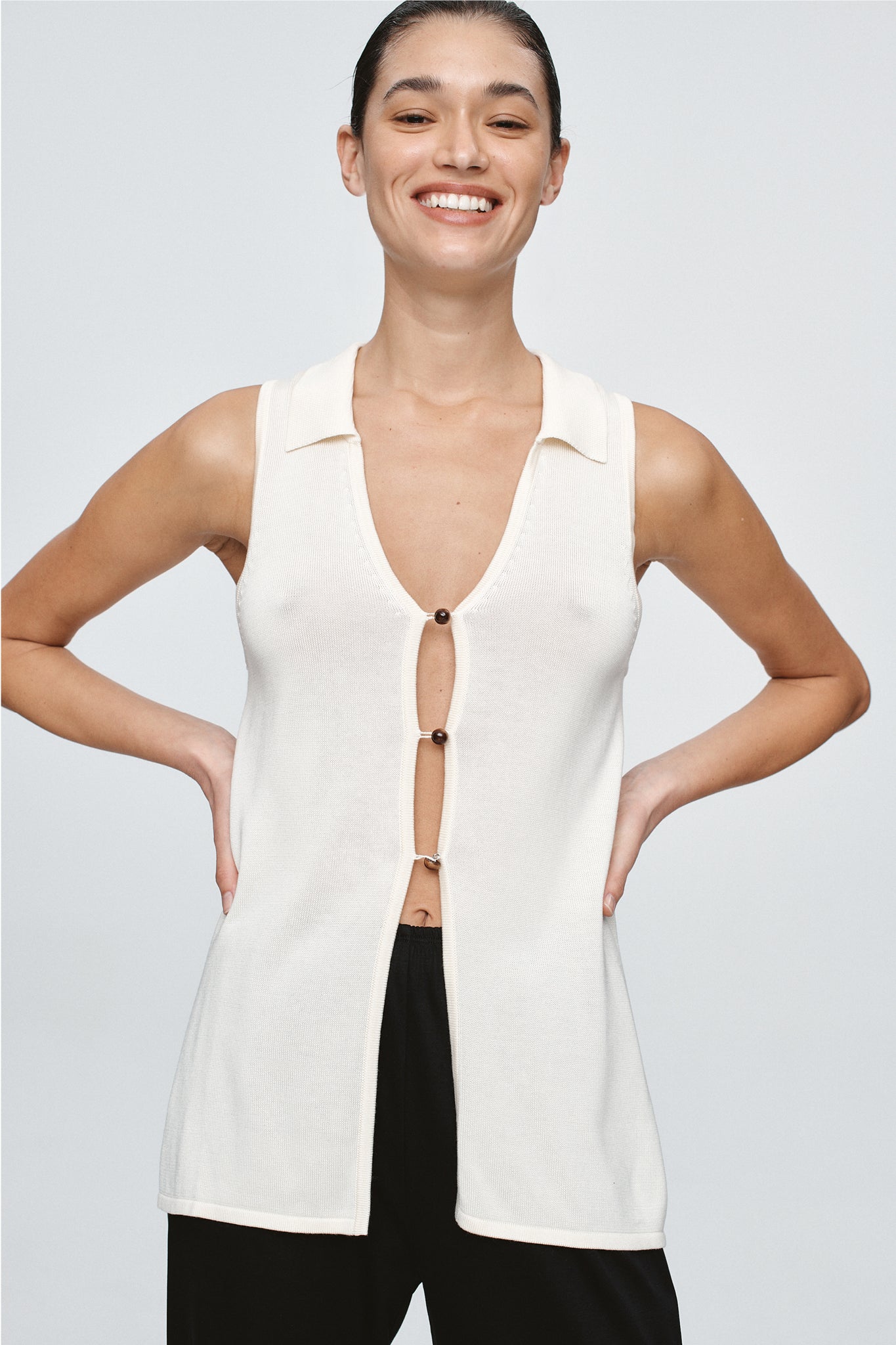 image of a model wearing the Marle Mo top in ivory