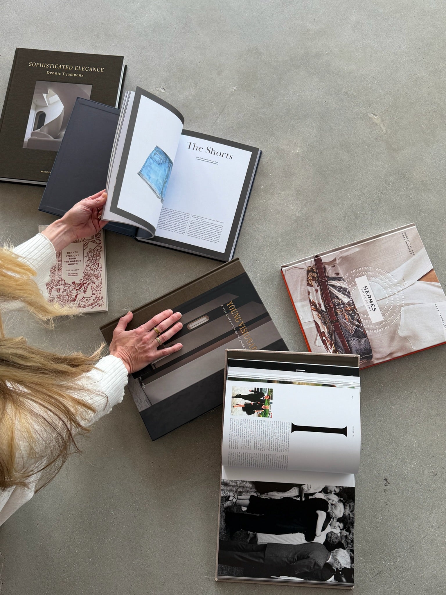 Sophisticated elegance, hermes philosophy, Young Visionaries coffee table book, and CBK and Jane Birkin: Icon of Style and Hermes straight from the horse’s mouth small coffee table book with other books.