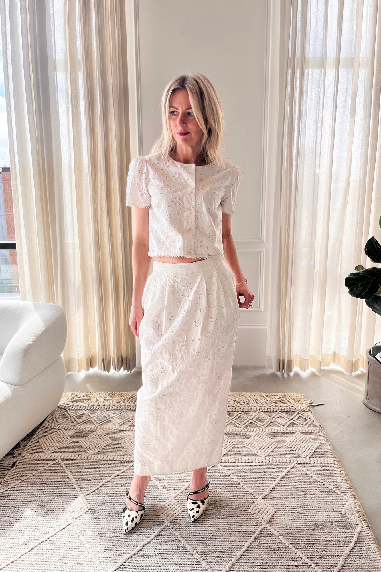 image of a woman wearing the Posse Salma Top and Skirt