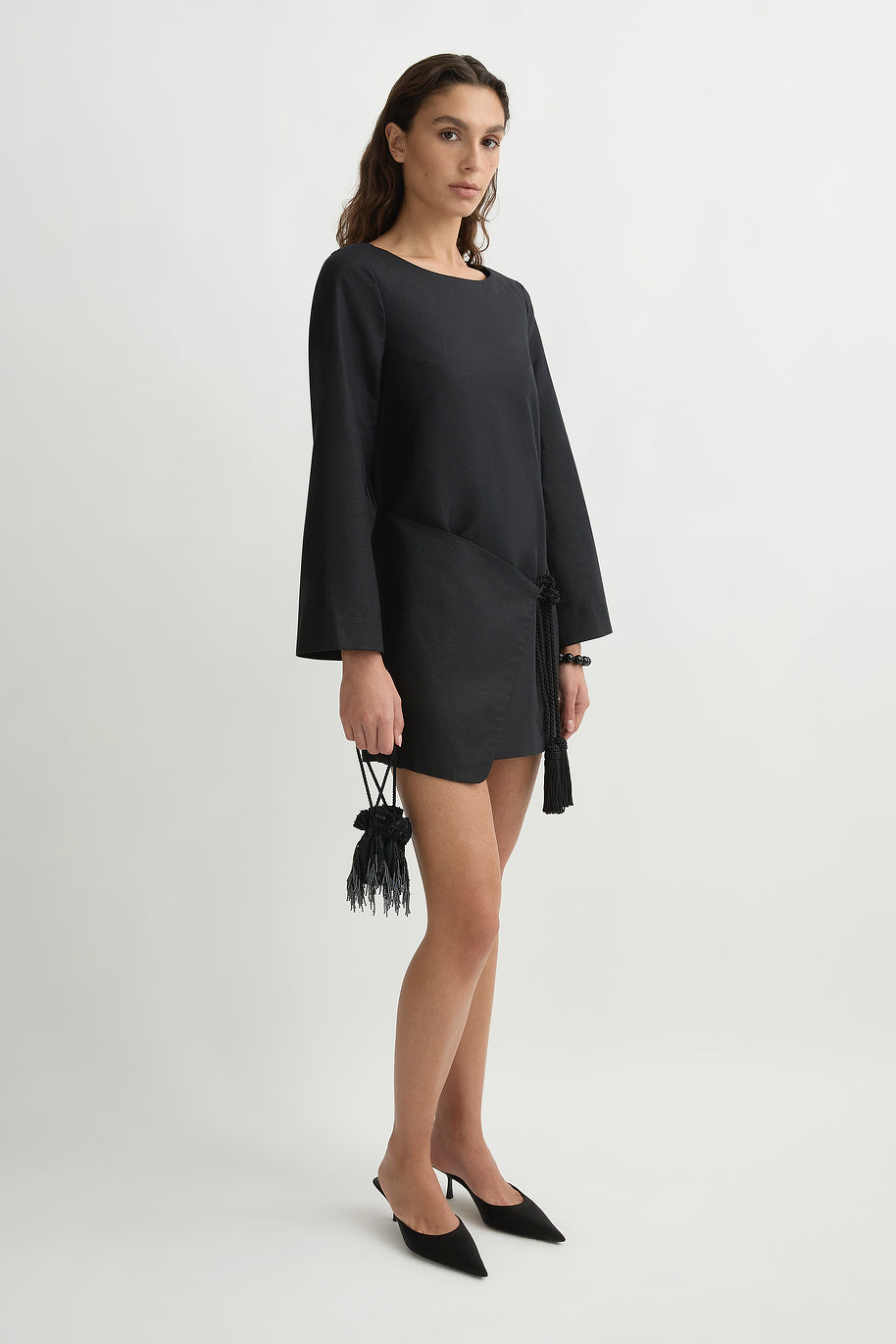image of a woman wearing the Posse Yvette Kaftan Dress