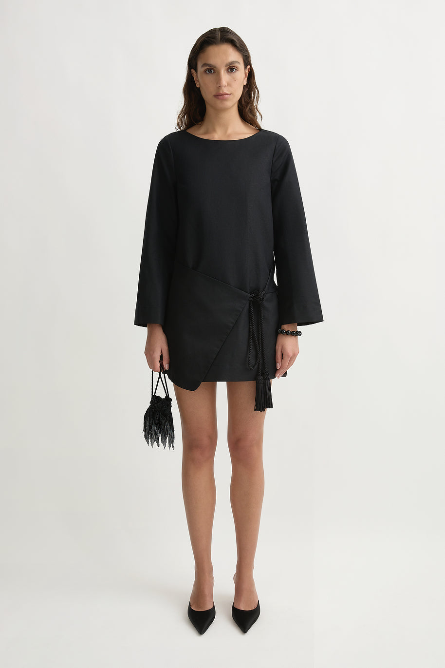 image of a woman wearing the Posse Yvette Kaftan Dress