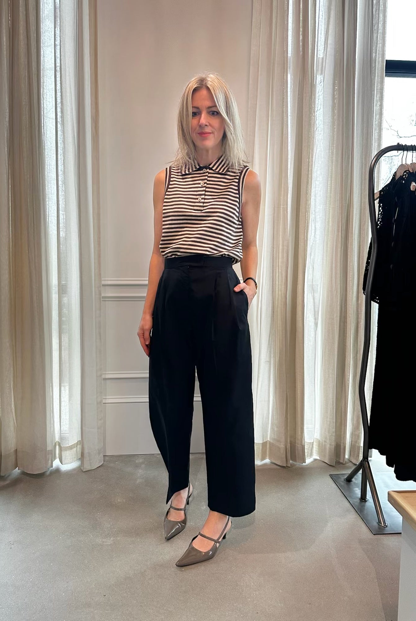 image of a model wearing the Rachel Comey Babar Pants in Black and Pola Vest