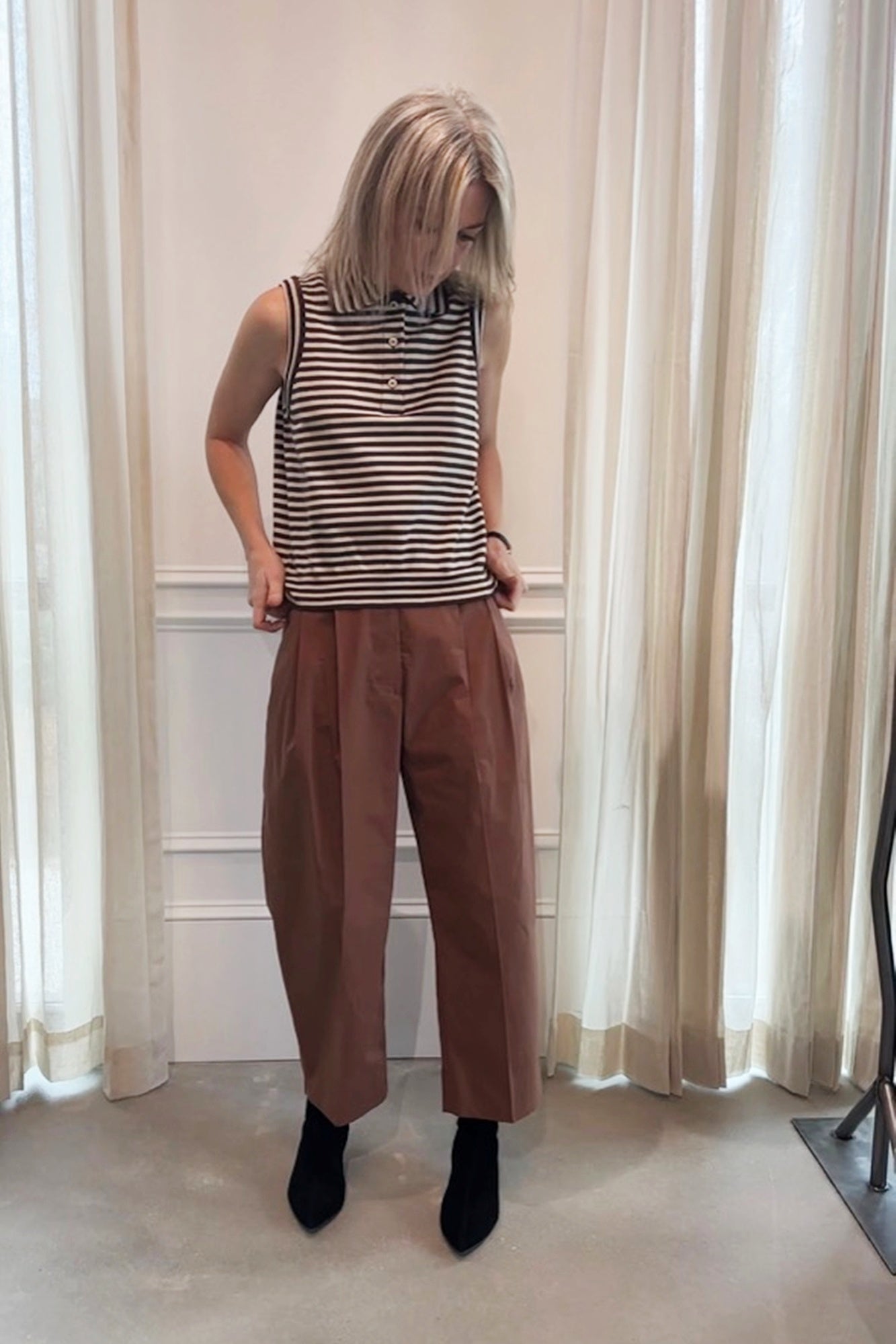 image of a woman wearing the Rachel Comey Babar Pants in Sienna and Pola Vest