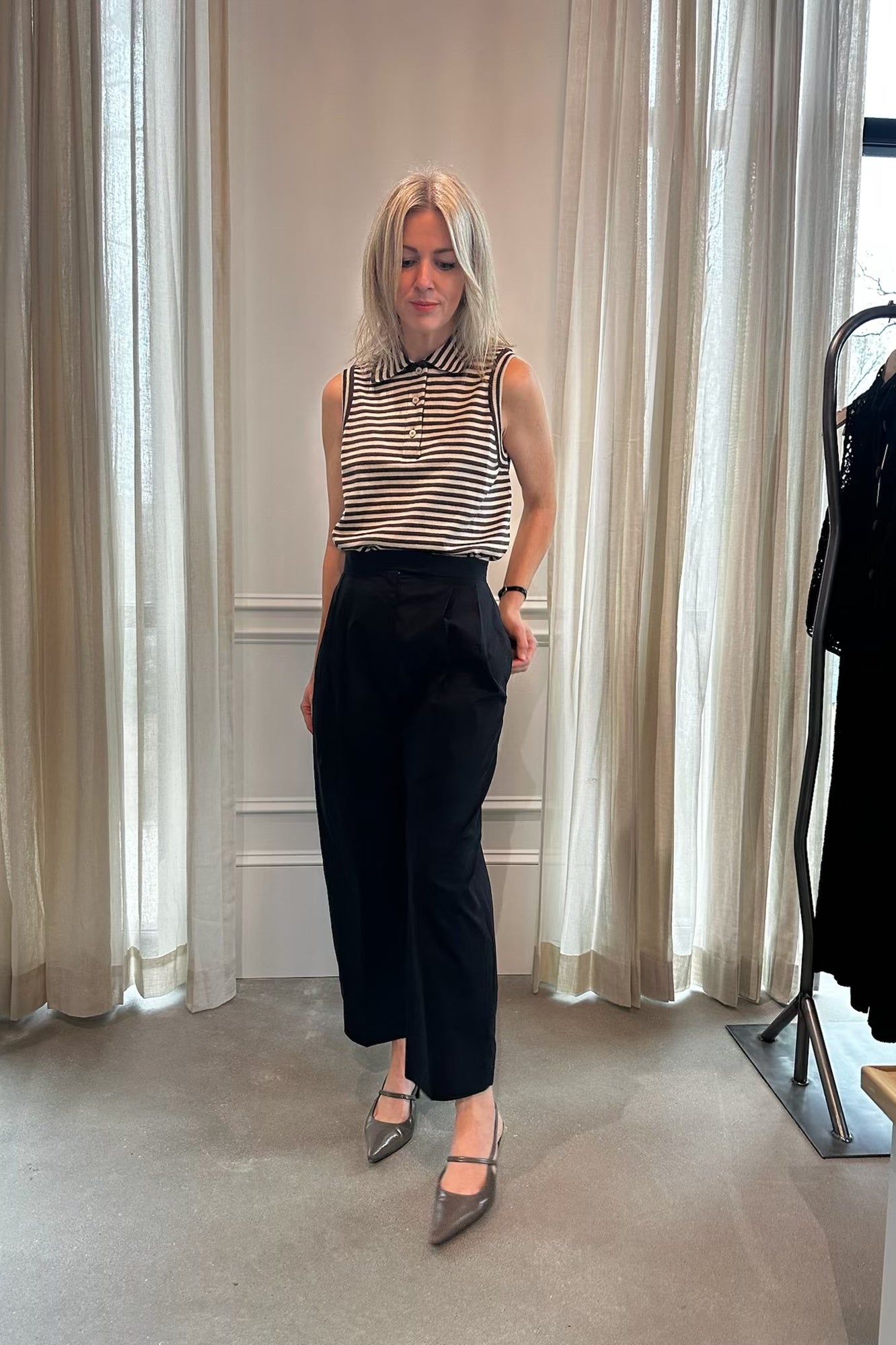image of a woman wearing the Rachel Comey Babar Pants in Black and Pola Top
