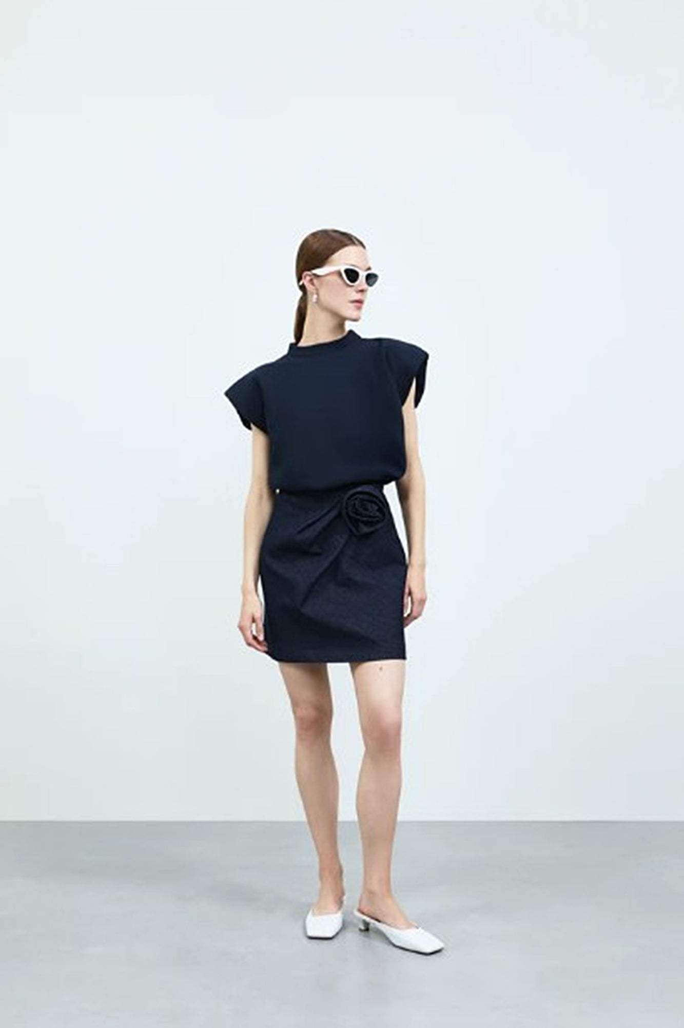 image of a model wearing the Rhune Moira Skirt