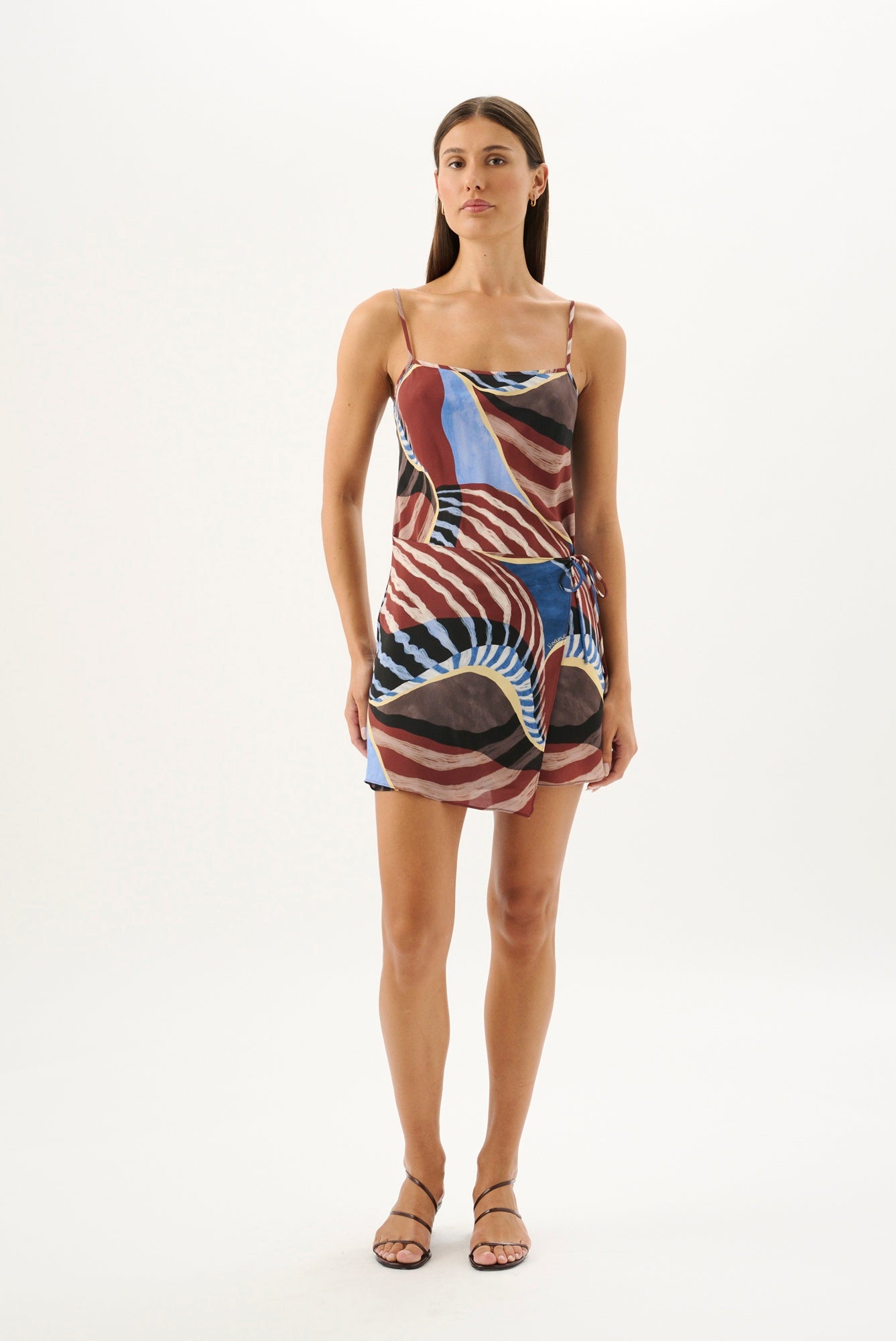 image of a woman wearing the Roame Elsa Mini Dress