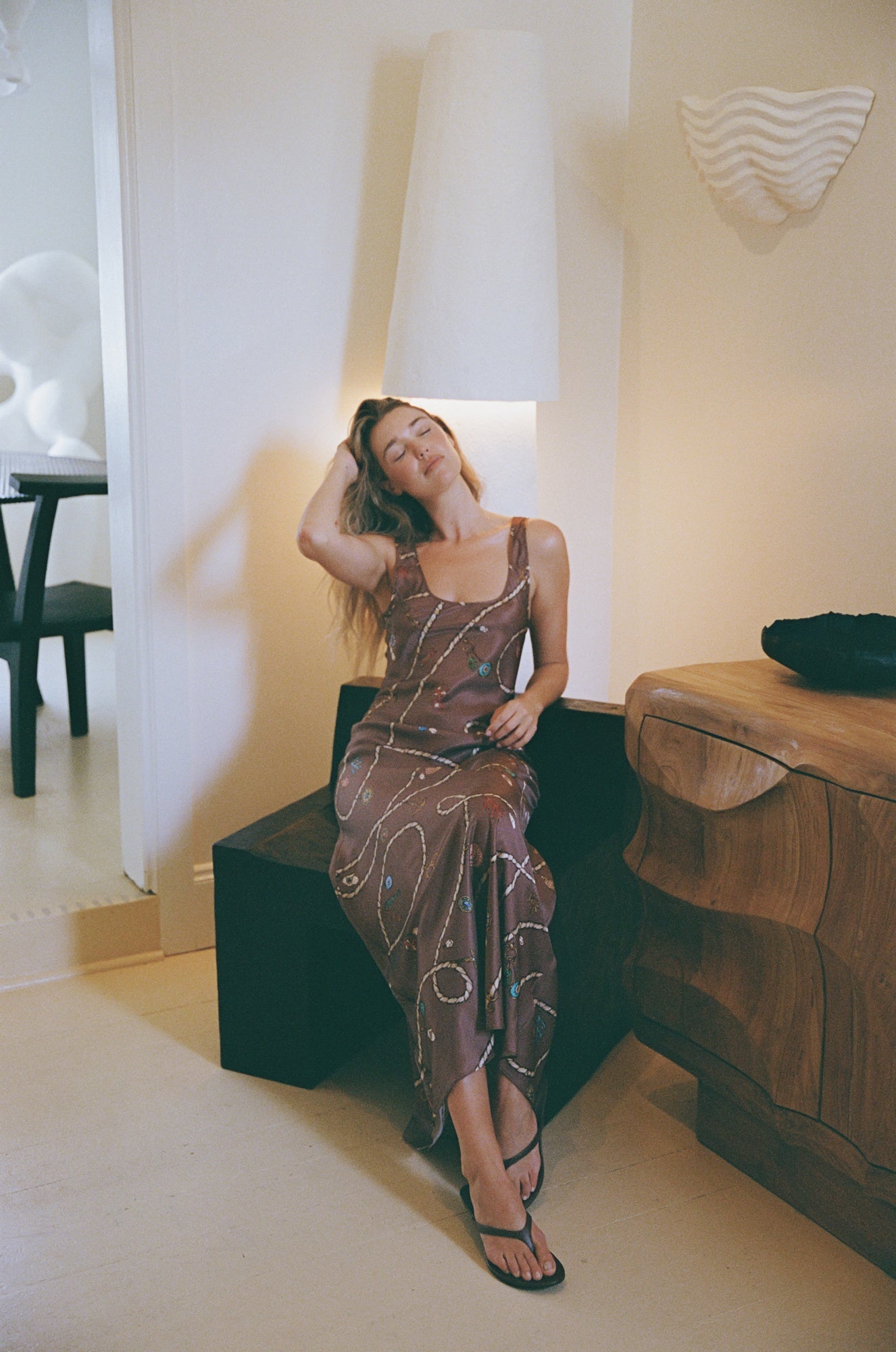 image of a woman wearing the Roame Jimena Dress