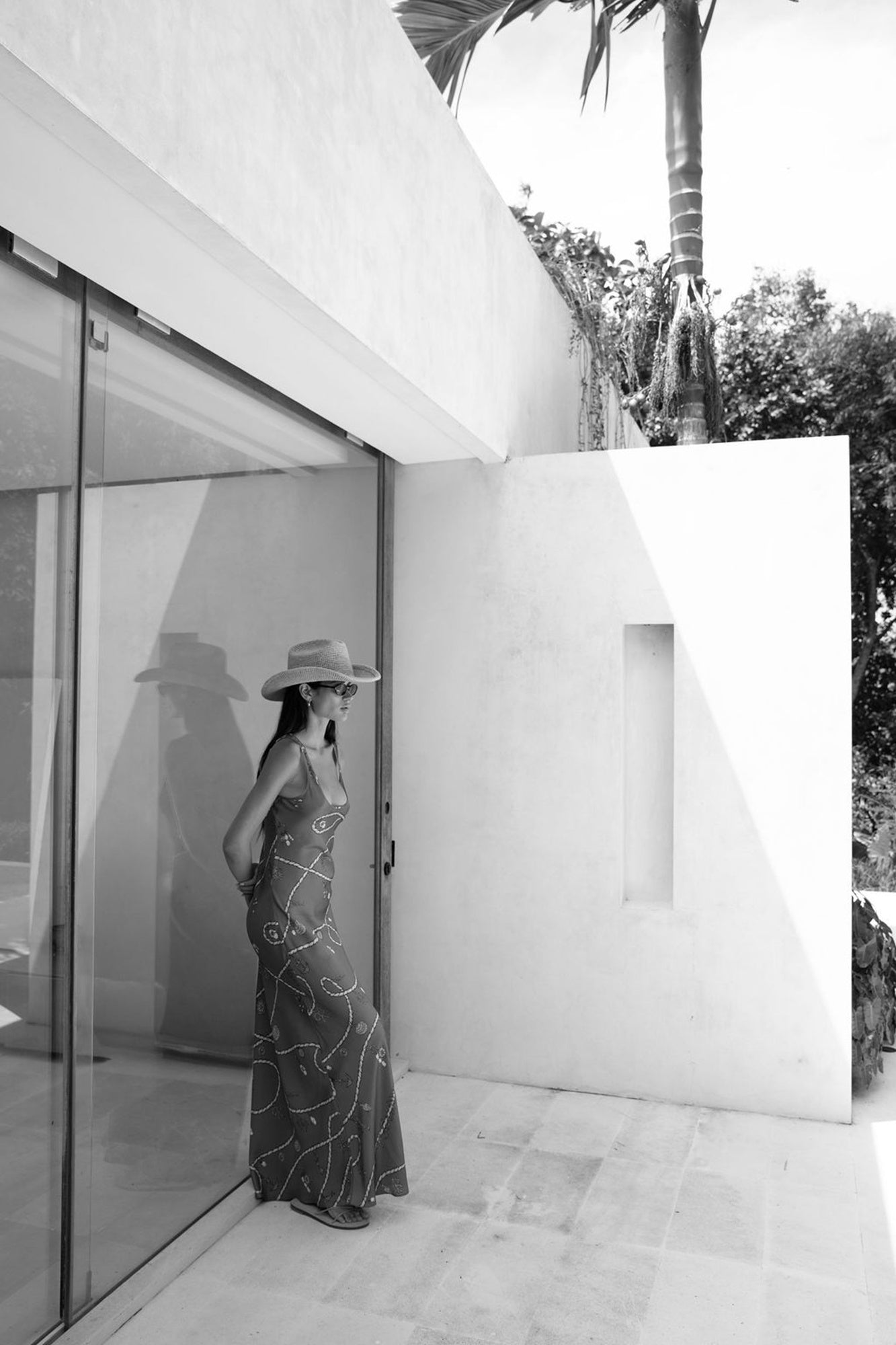 image of a woman wearing the Roame Jimena Dress