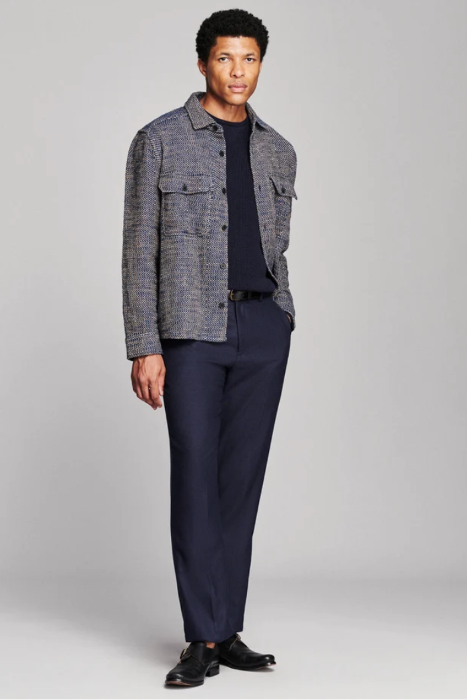A man wearing the Billy Reid Herringbone CPO Overshirt against a white background