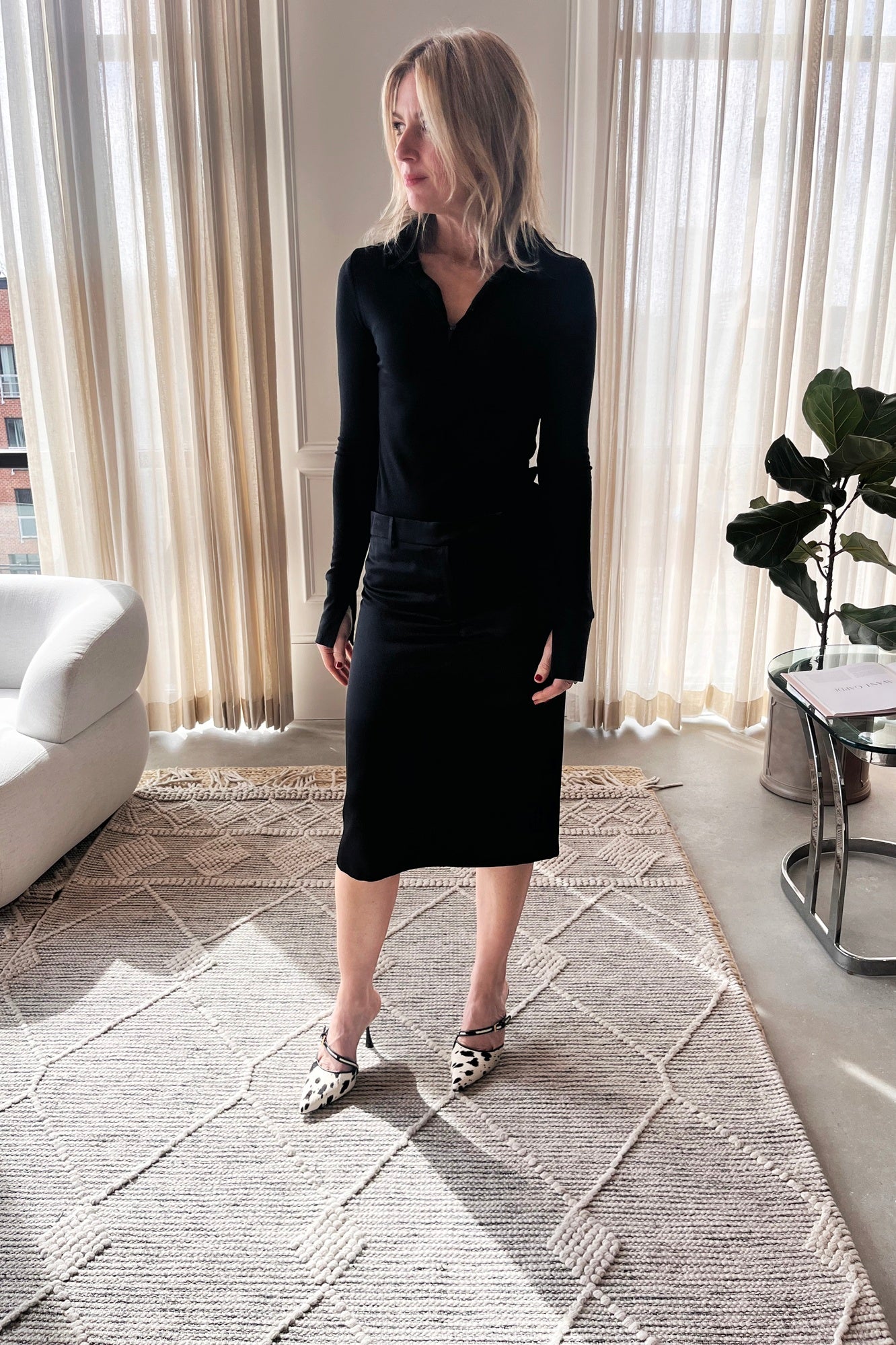 image of a woman wearing the Garment Bree Polo and Alfie Erin Skirt