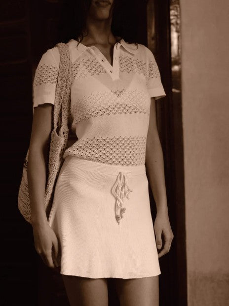 image of a model wearing the Garment Tanzania Polo Dress