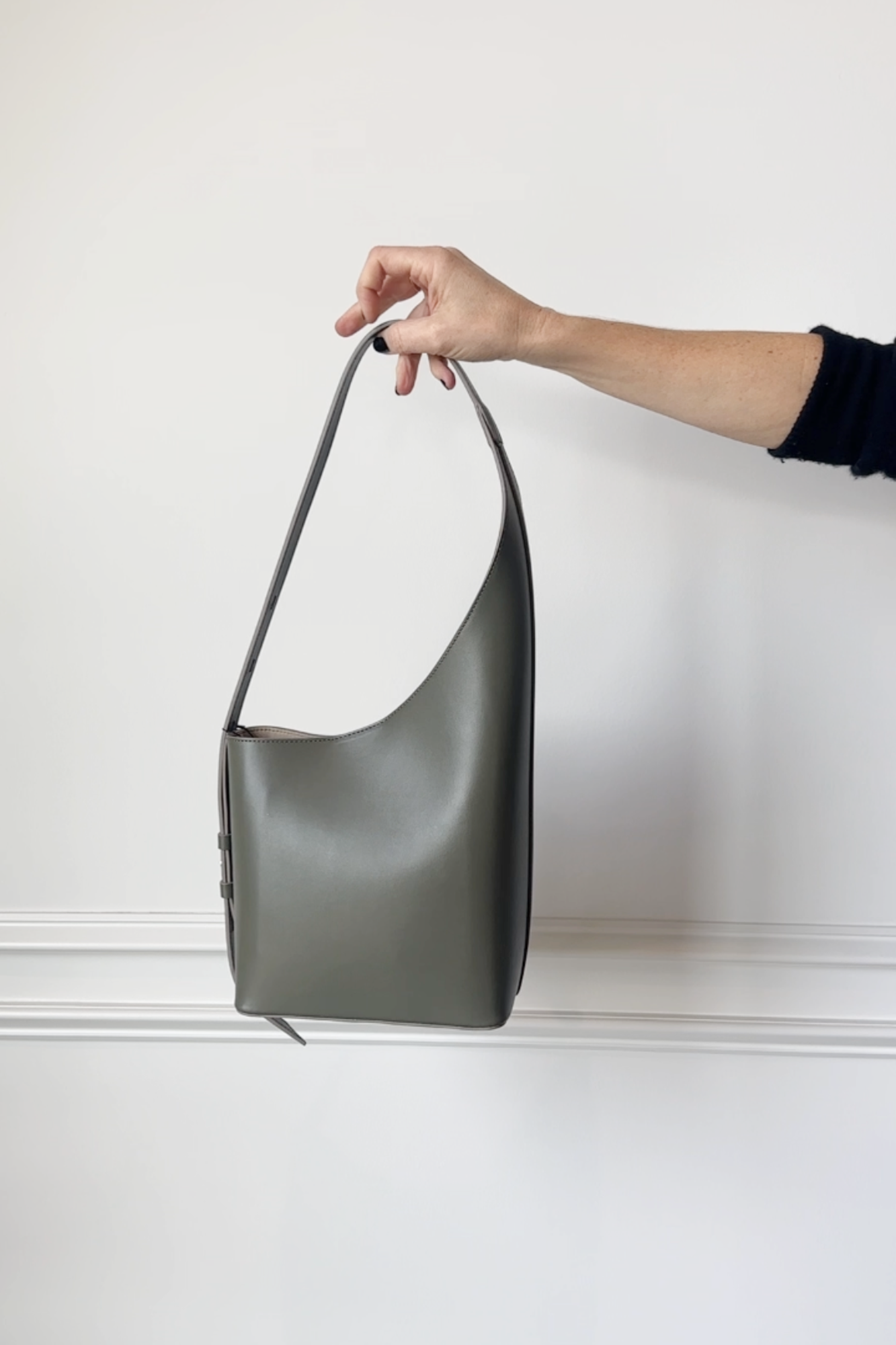 image of the aesther ekme demi lune bag in sage