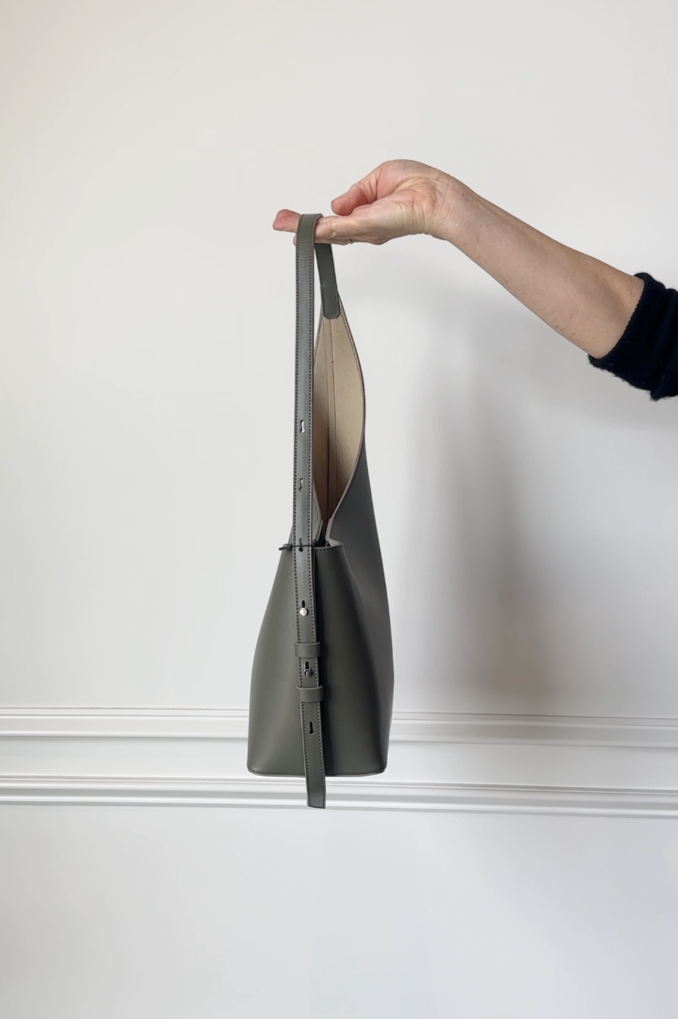 image of the aesther ekme demi lune bag in sage