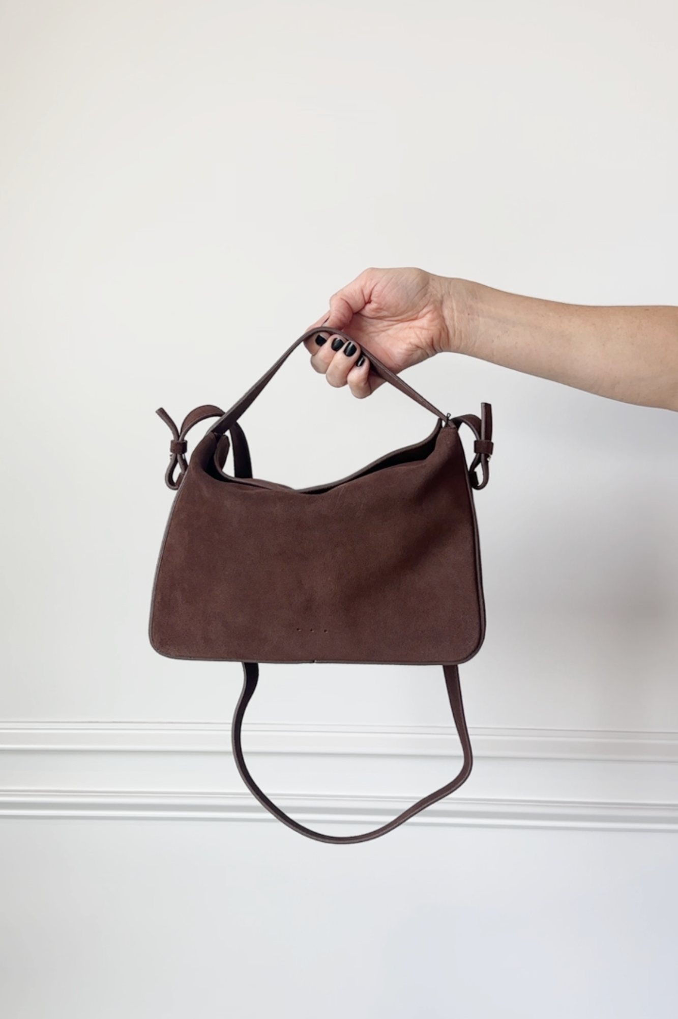 image of the aesther ekme soft baguette crossbody bag in suede cocoa