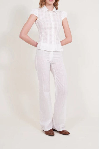 image of a model wearing the Alfie Abby Shirt in checkered poplin