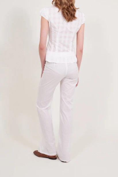 back image of a model wearing the Alfie Abby Shirt in Checkered Poplin