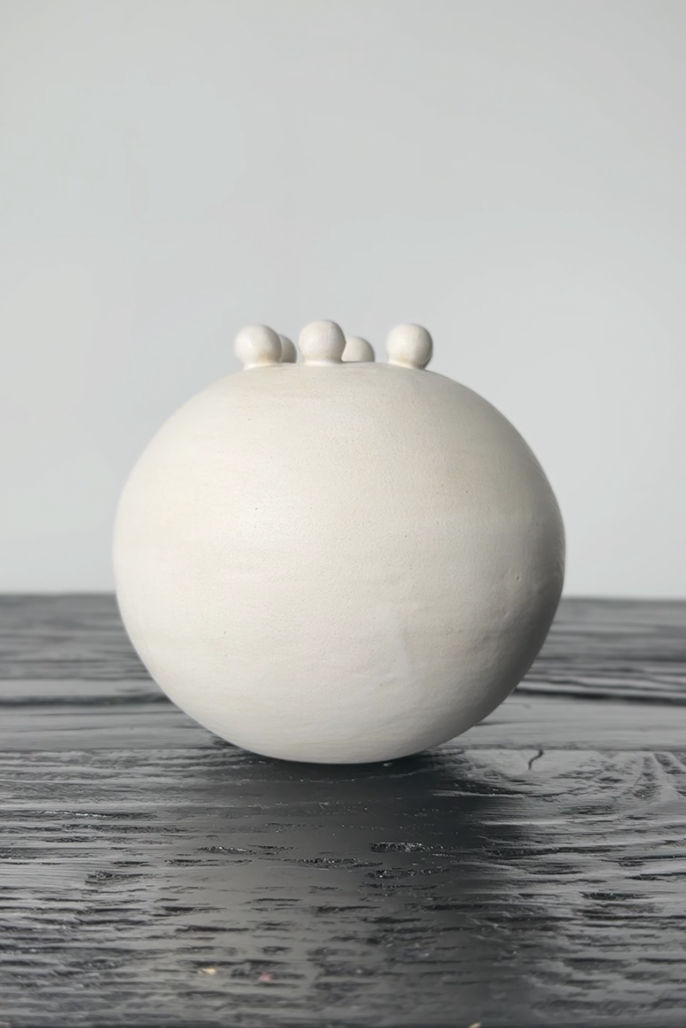 photo of hand crafted pottery, mini pearl vase 