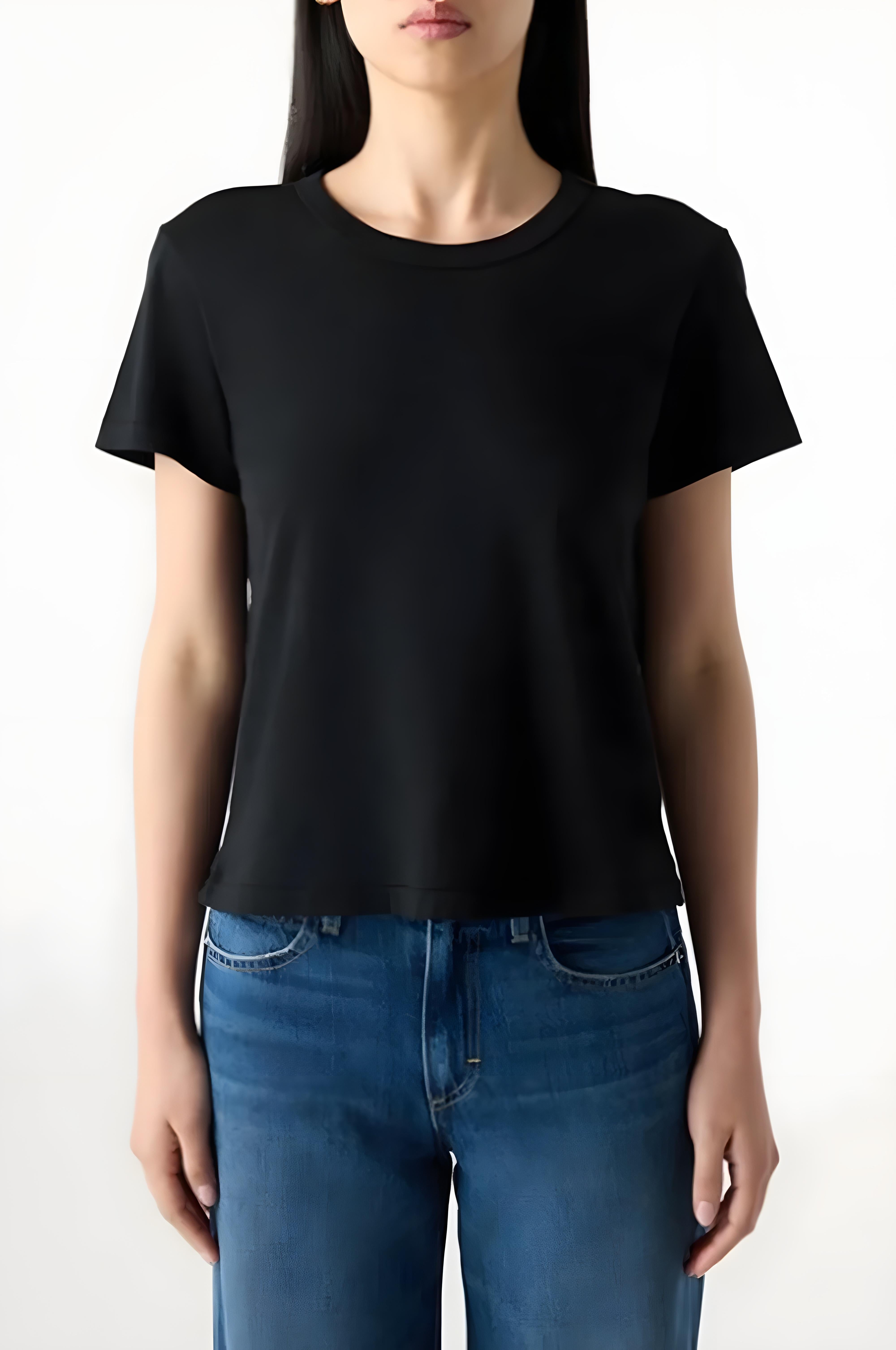 Person wearing a black t-shirt and blue jeans on a white background
