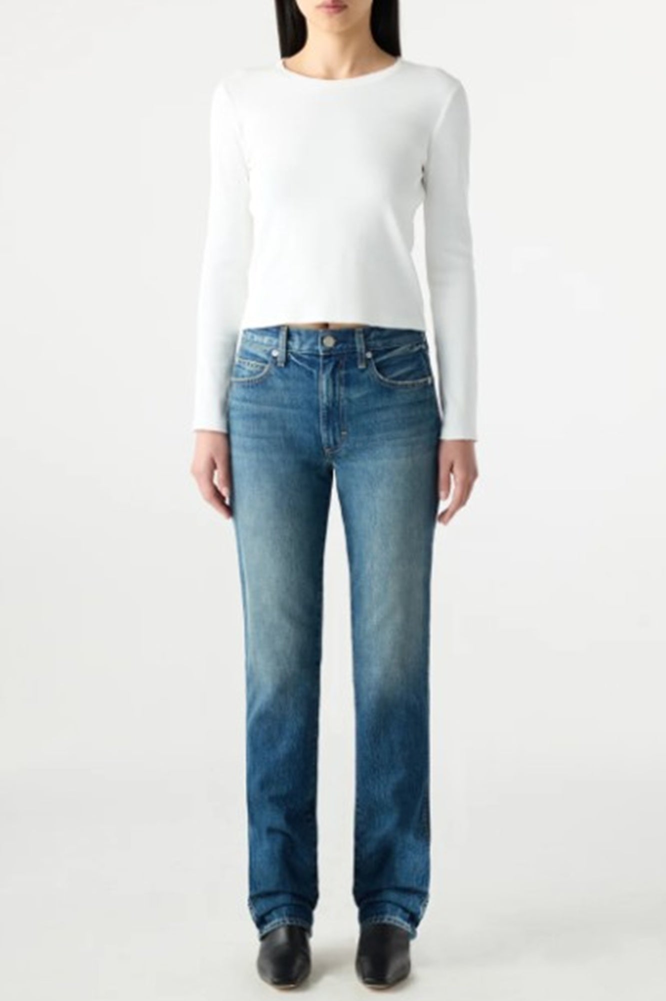 image of a model wearing the amo mira jeans in fancy