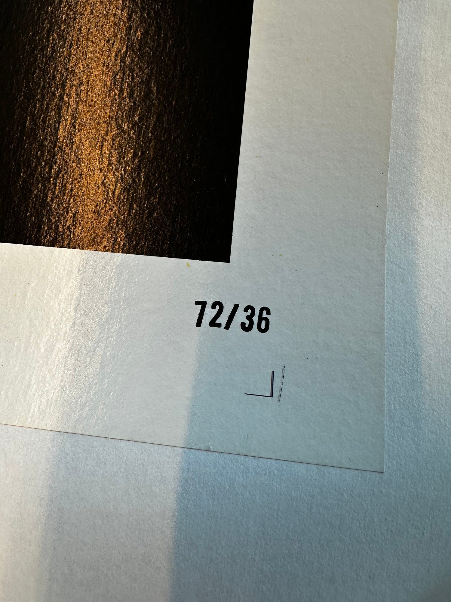 Close-up Cabaret poster on a linen surface with '72/36' printed on it