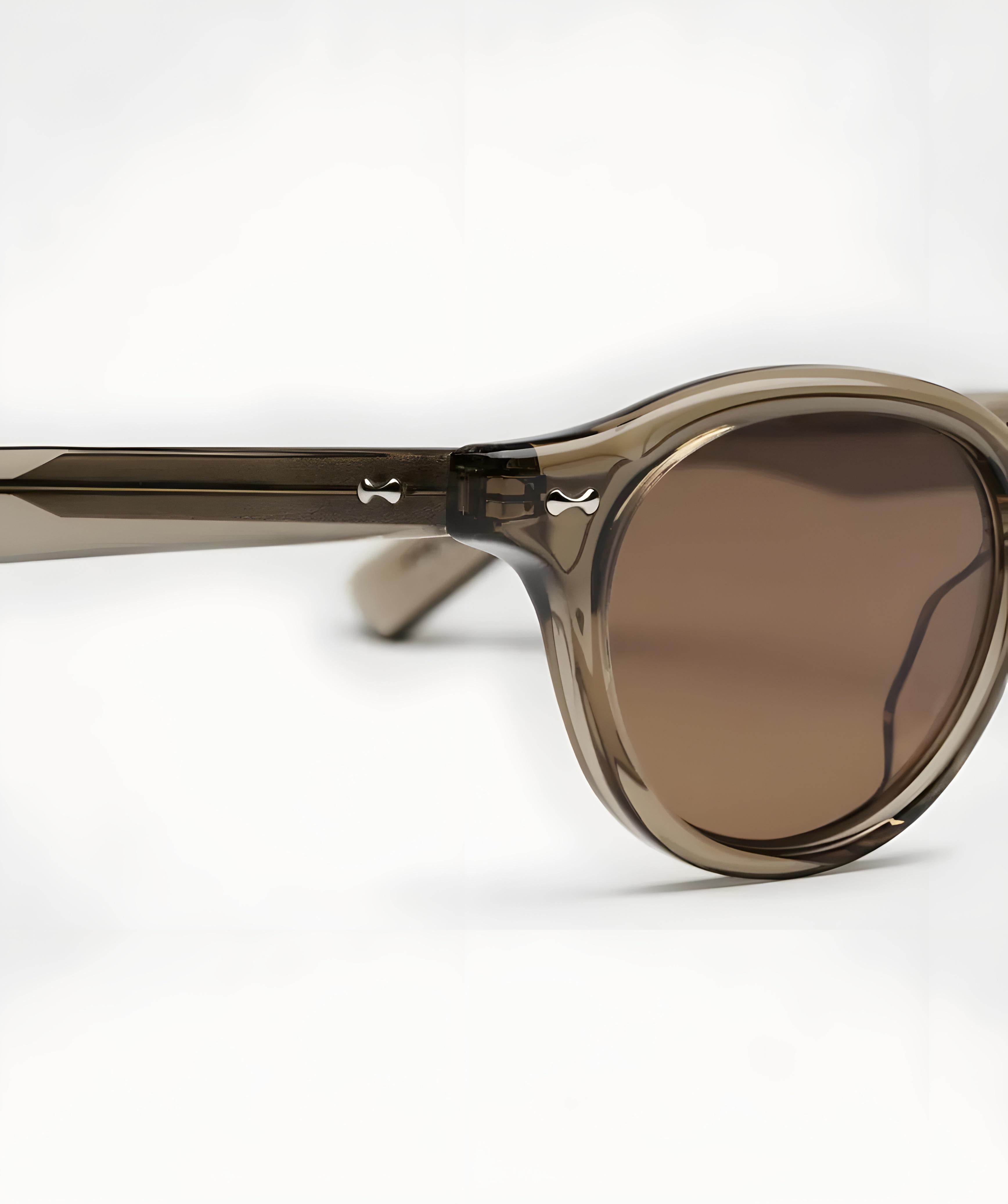 Brown sunglasses with a white background