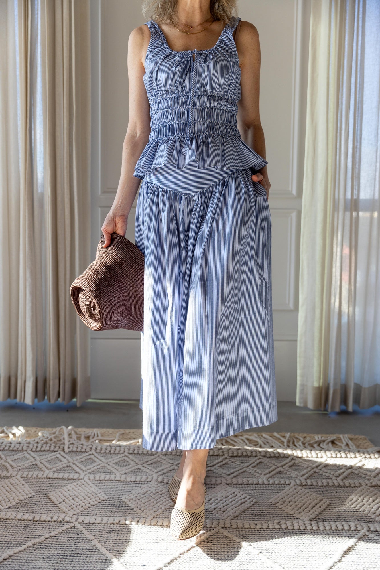 image of a woman wearing the Ciao Lucia Gigi Top and Zoe Skirt
