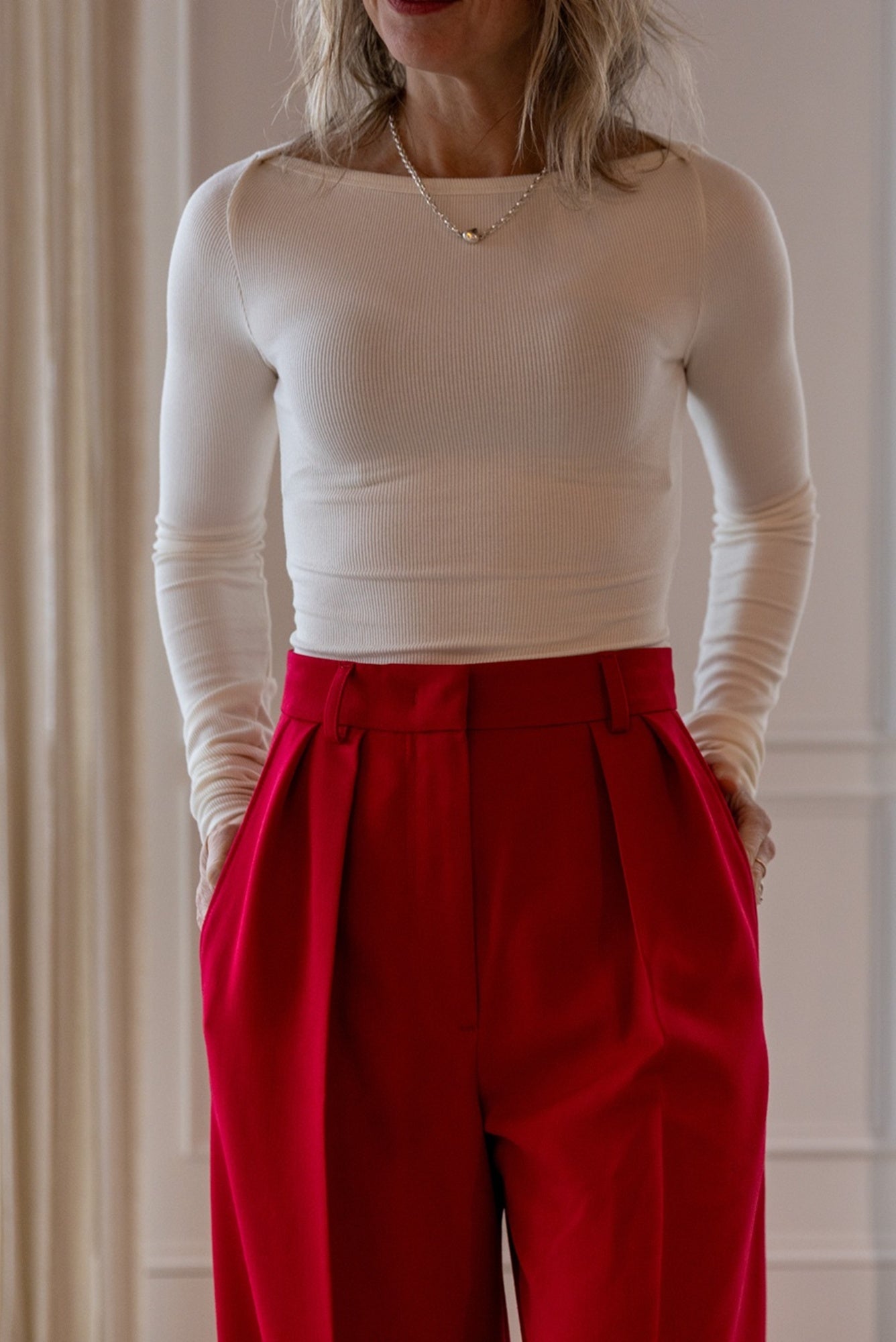 image of a woman wearing the Eterne Boatneck tee and Rhune Celine Pants