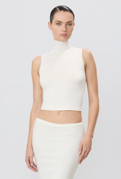 model wearing the eterne harlow top in ivory