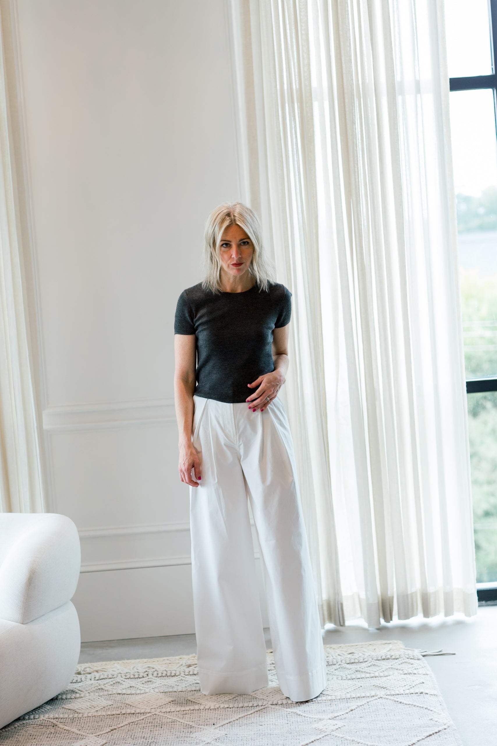 image of a woman wearing the eterne rib stitch baby tee