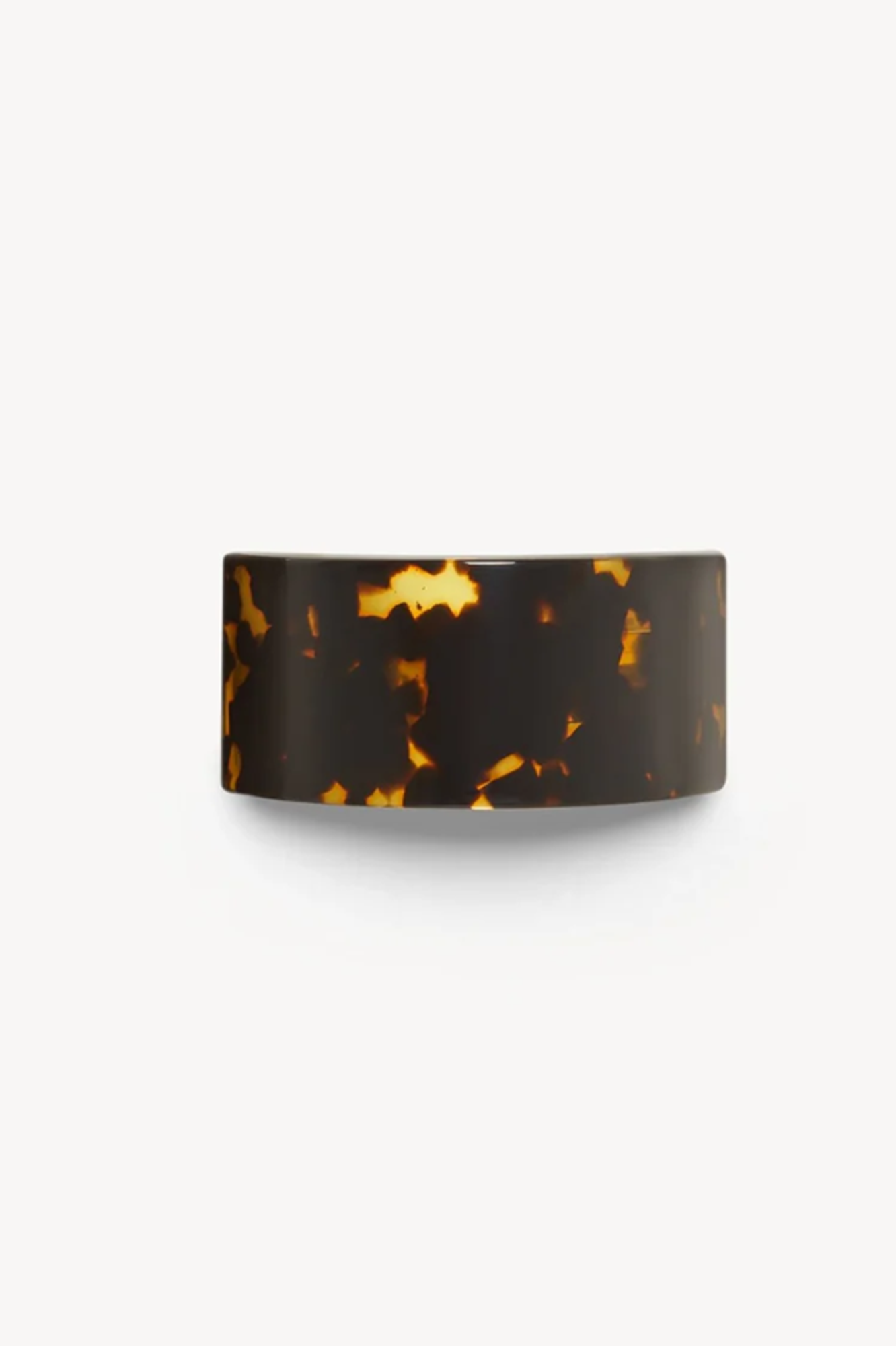 Tortoiseshell checked frech pony barrette on a white background