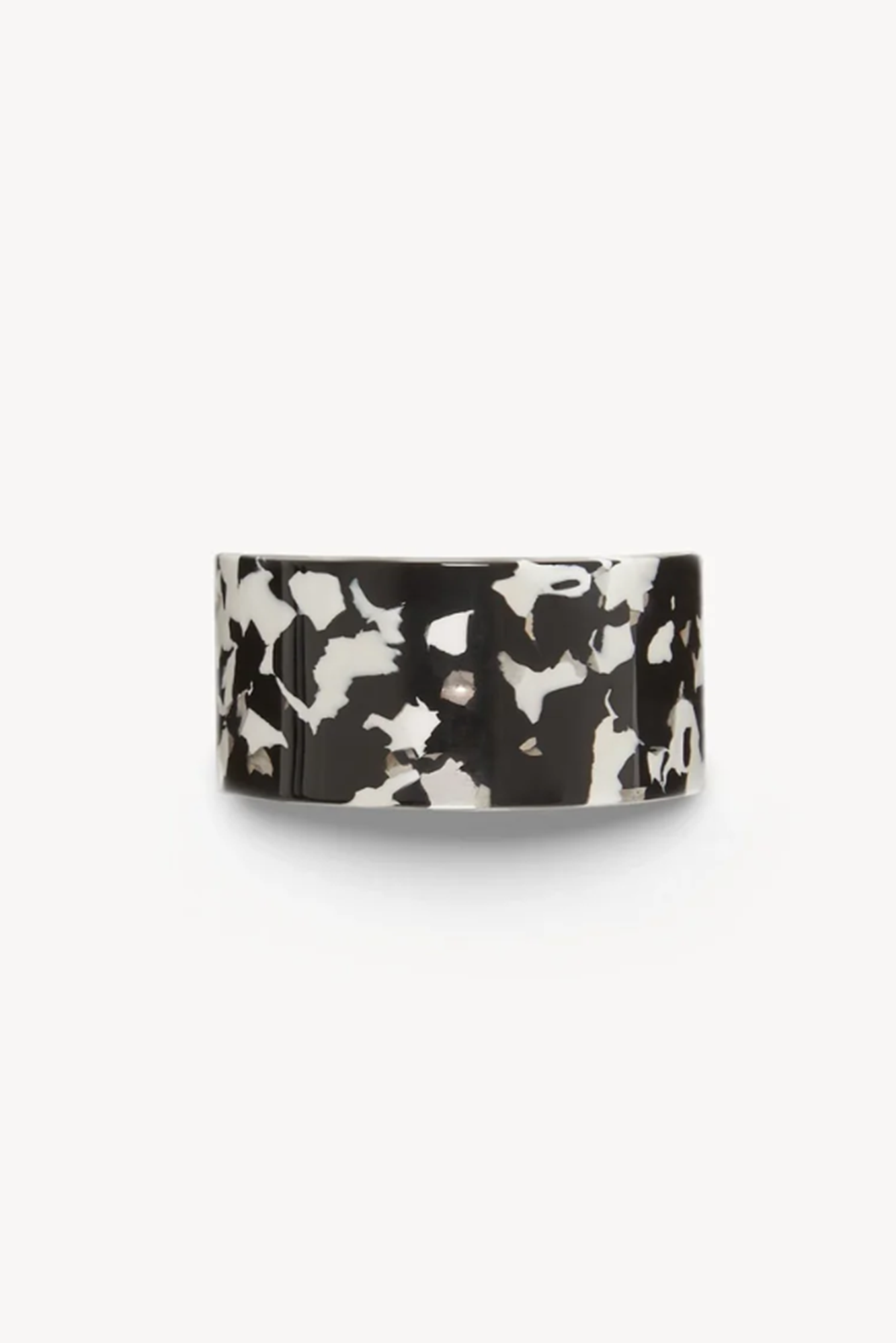 noir or Black and white patterned french pnoy barrette on a white background