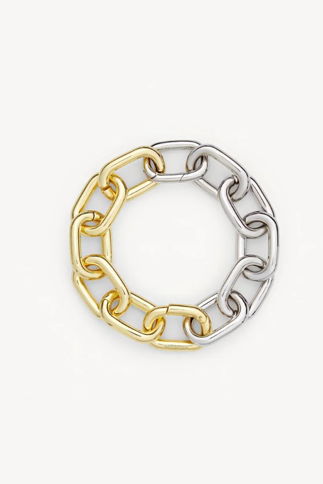 Two-tone gold and silver chain-link bracelet on a white background