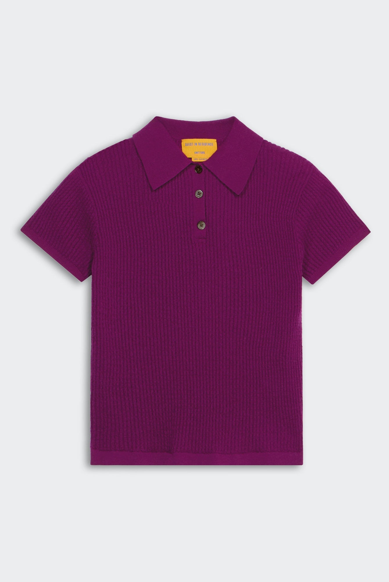 Purple polo shirt on a light gray background