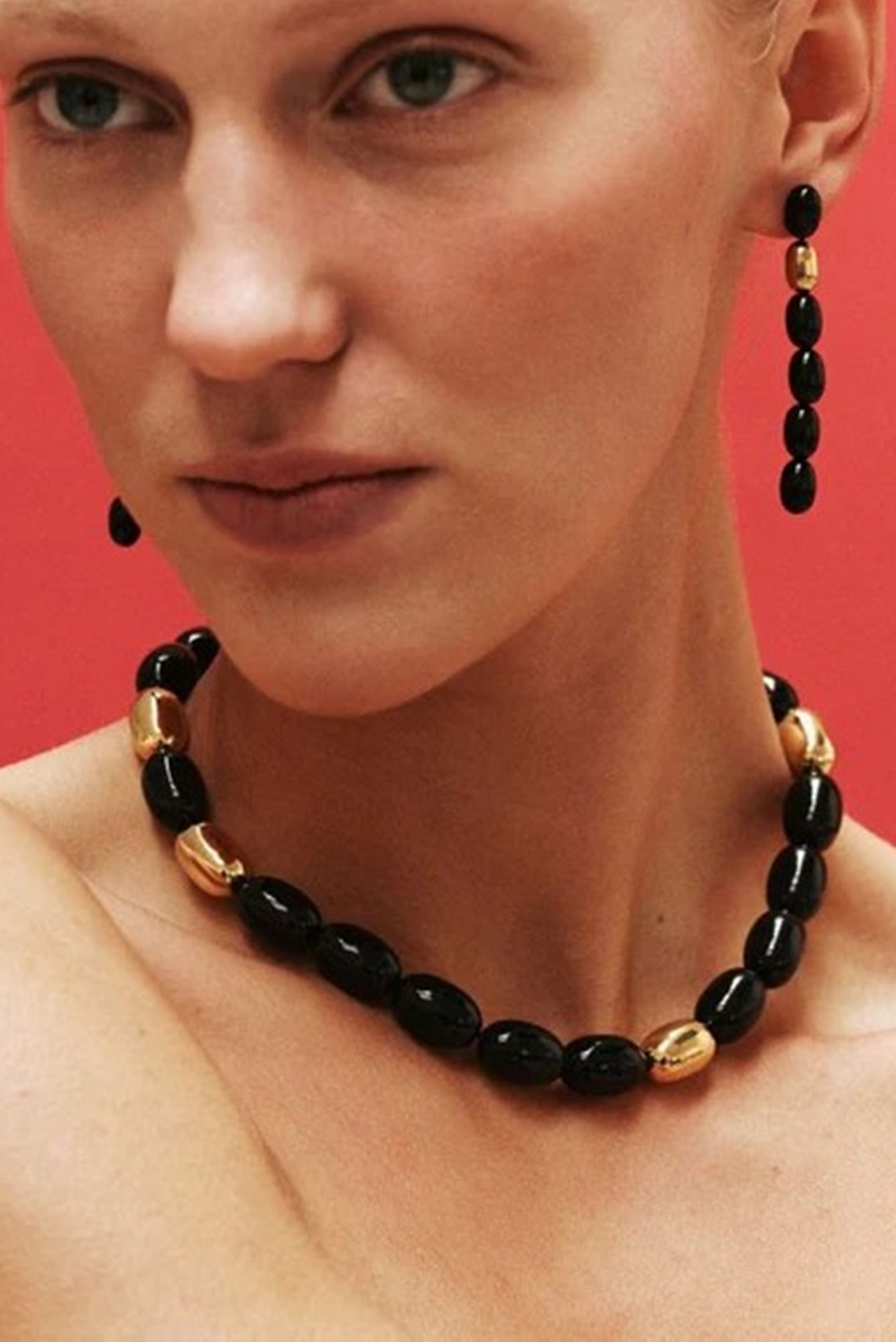 image of a model wearing the Heaven Mayhem clementine necklace