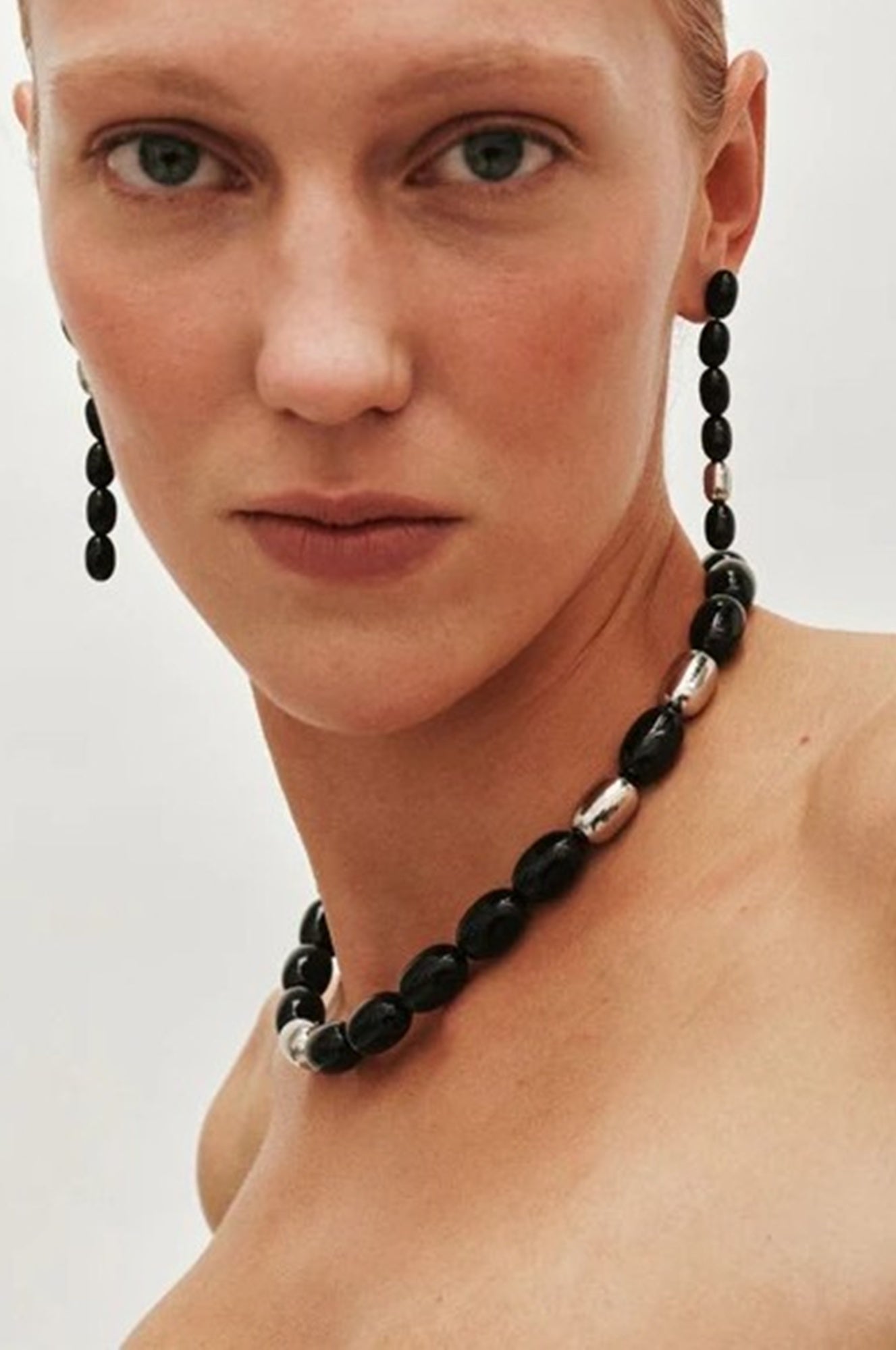 image of a model wearing the Heaven Mayhem Clementine necklace