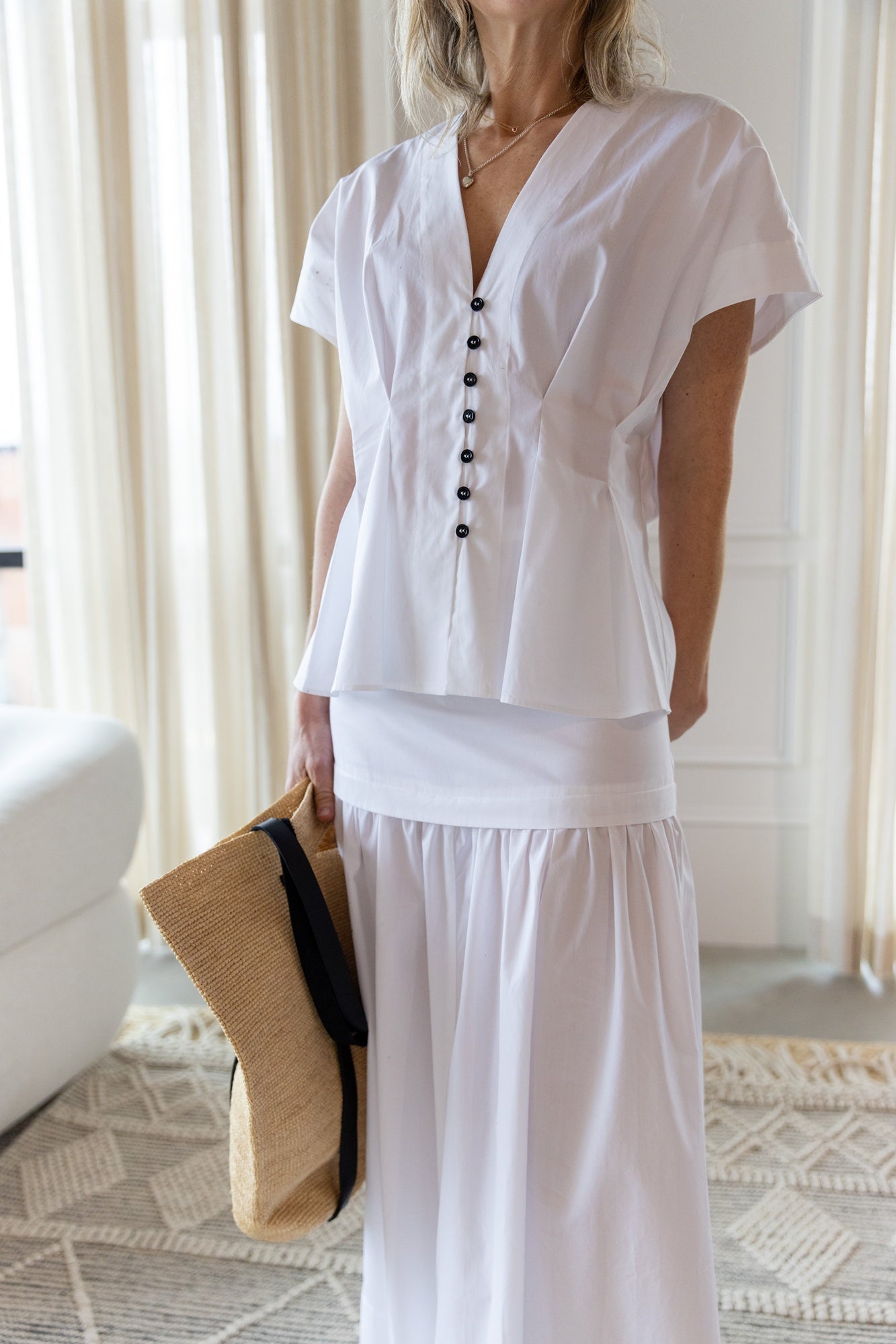 image of a woman wearing the House of Dagmar Cinched Cotton Top