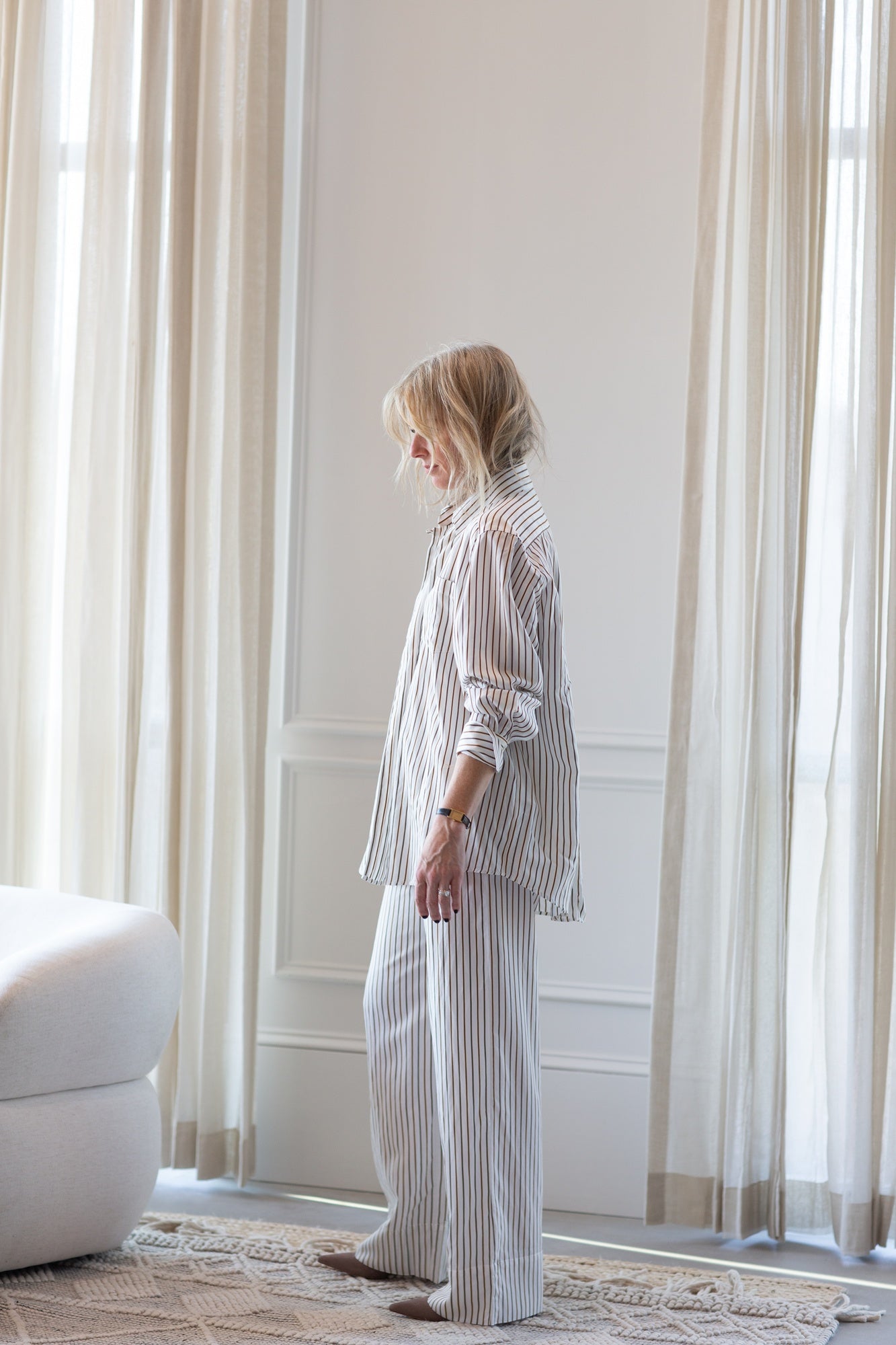 model wearing the house of dagmar fluid stripe relaxed trousers