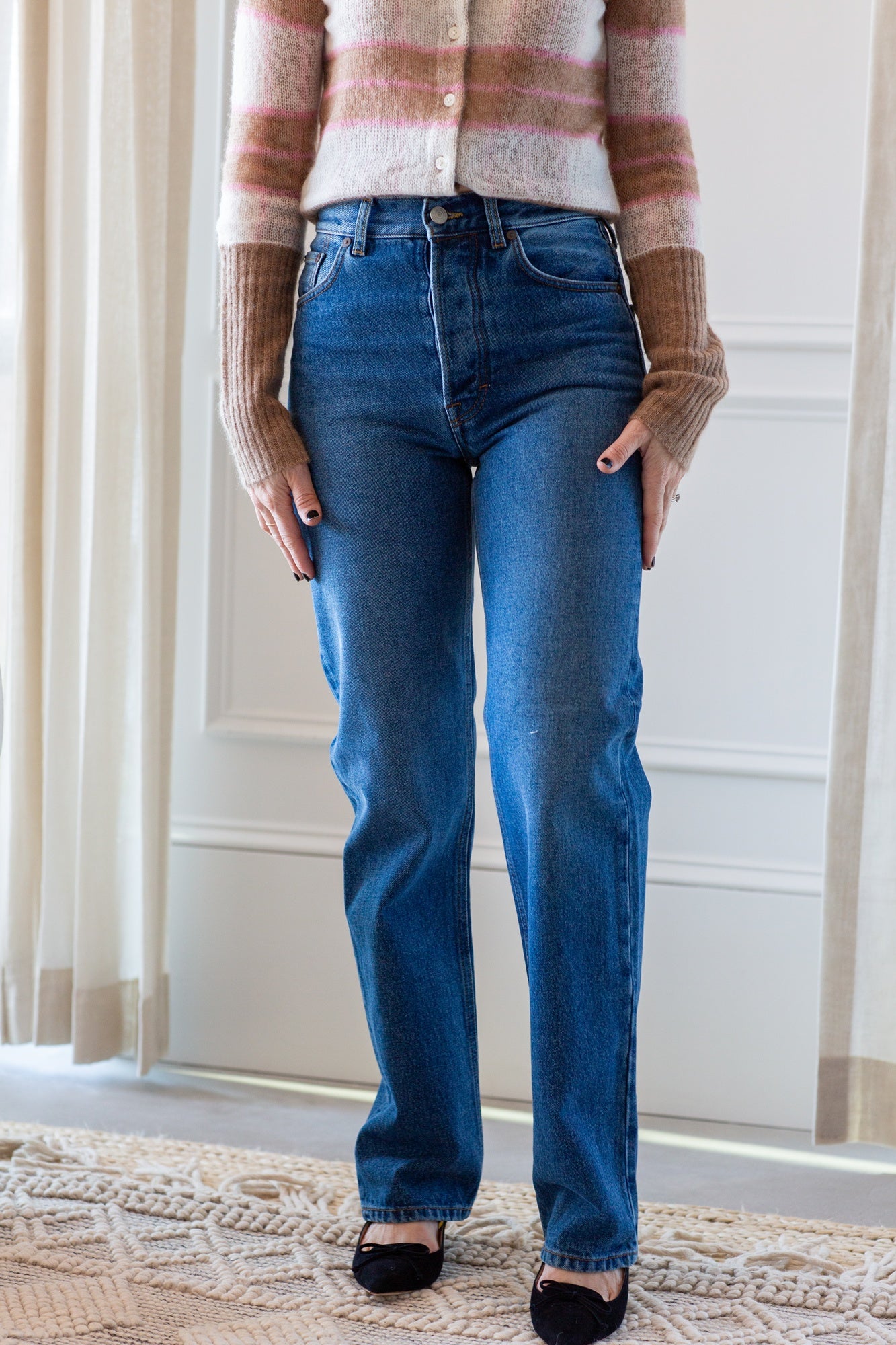 woman wearing the house of dagmar straight leg jeans