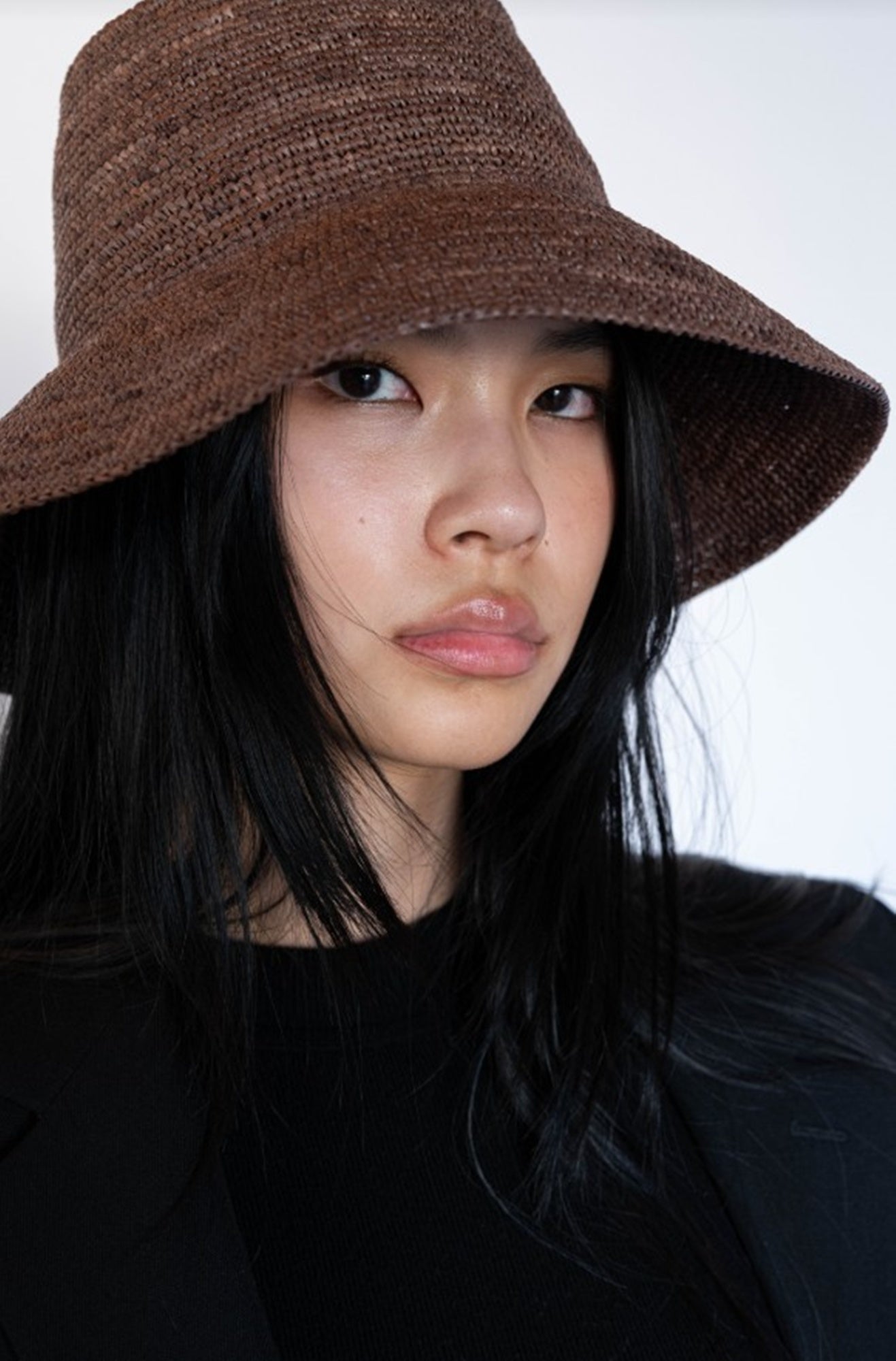 model wearing the janessa leone felix hat in brown