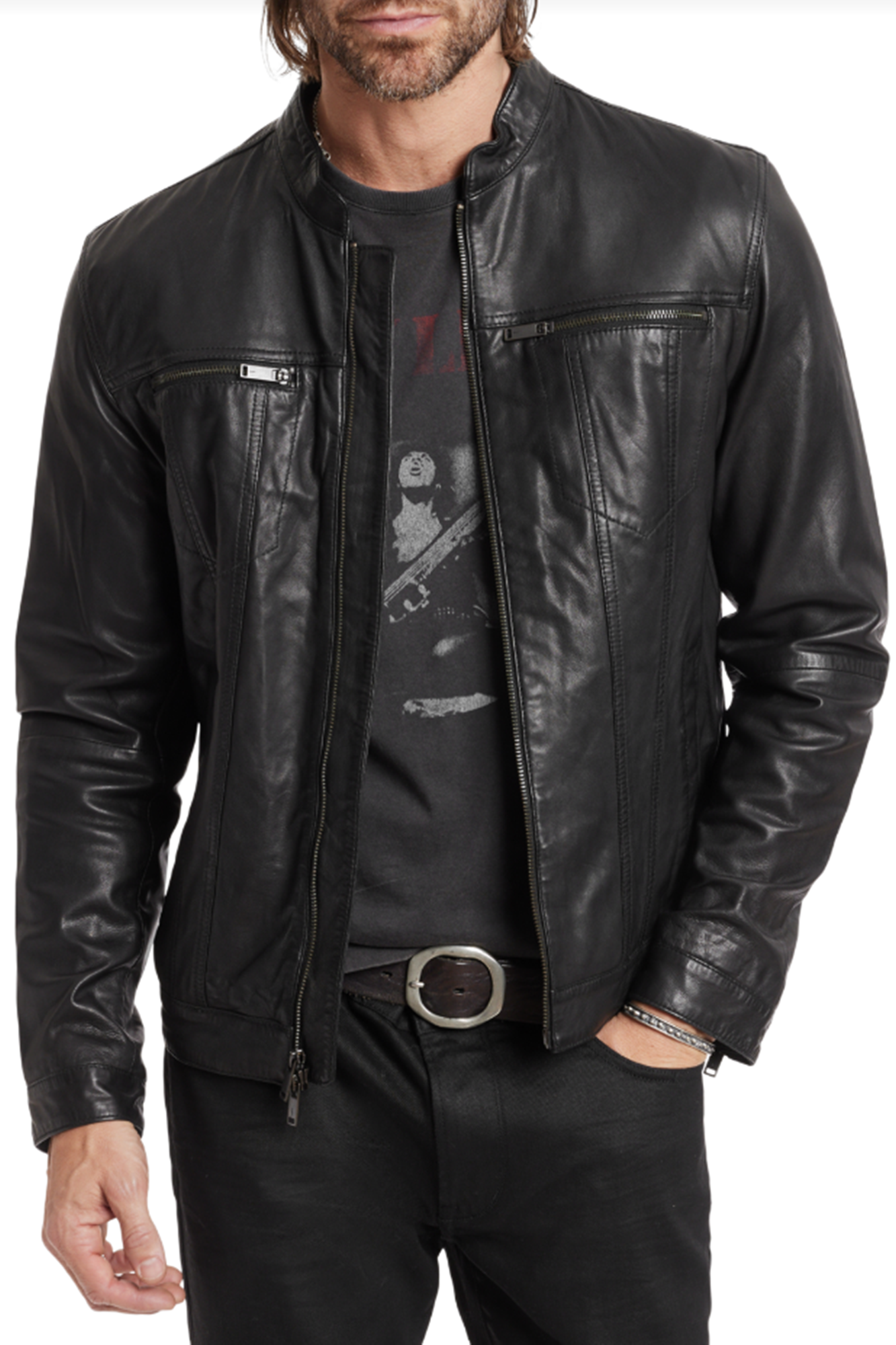 Man wearing a black leather jacket over a graphic t-shirt on a white background