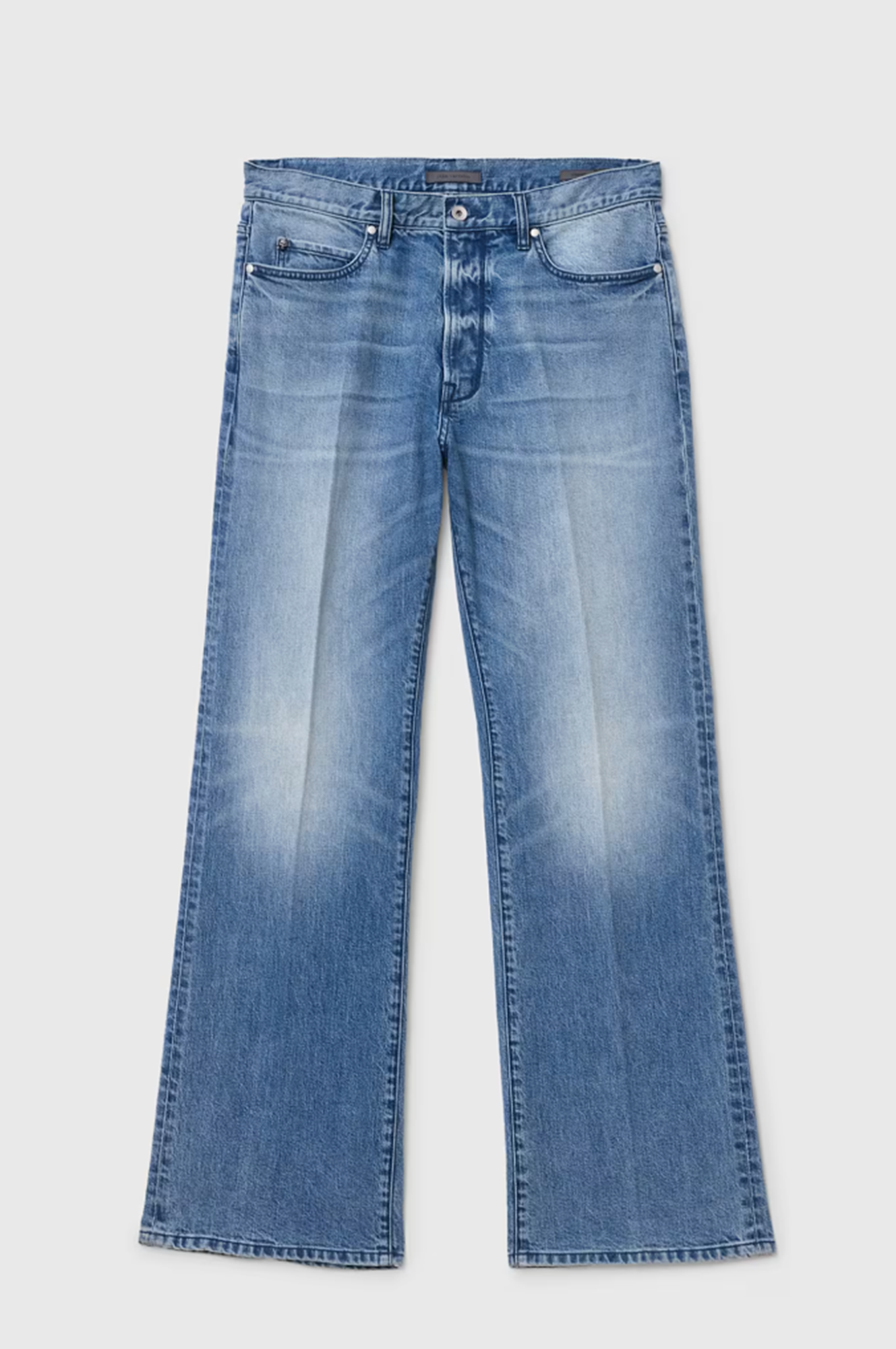 Pair of blue jeans on a light gray background