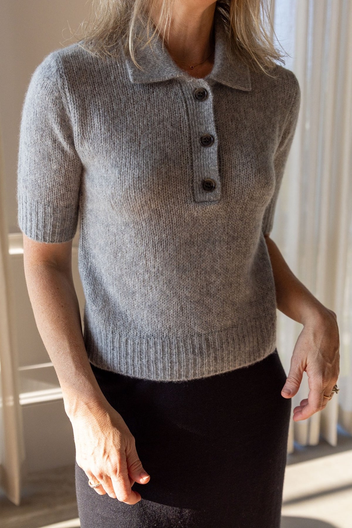 Lisa Yang Masy Sweater in cloudy grey silk cashmere, collared henley placket, styled with the Charlotta skirt