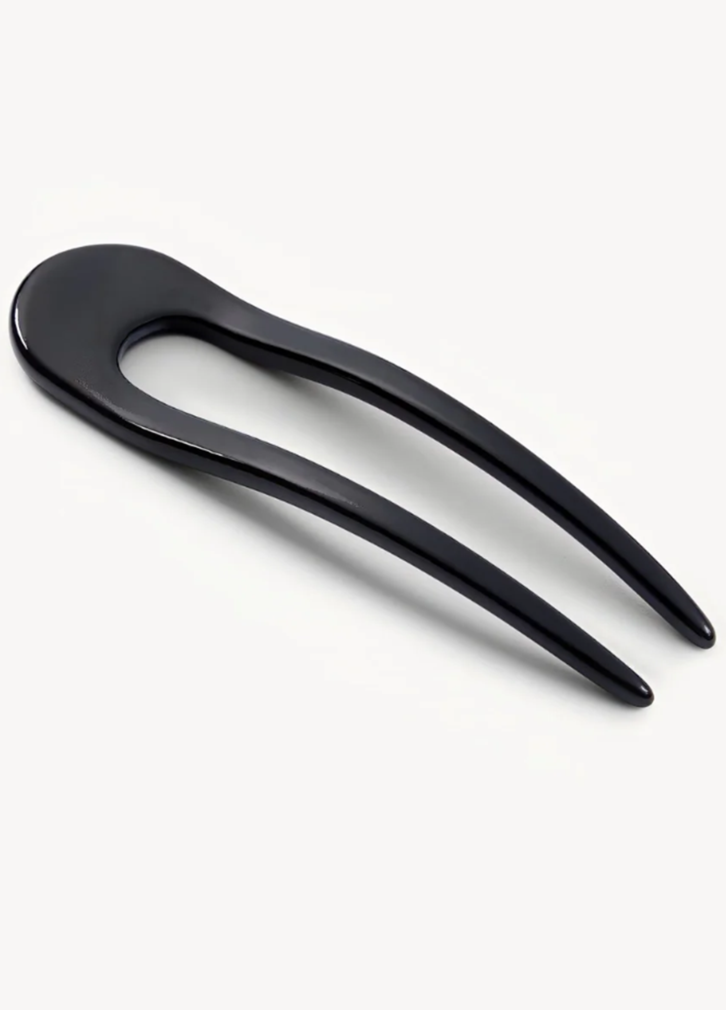 Black hair clip on a white background