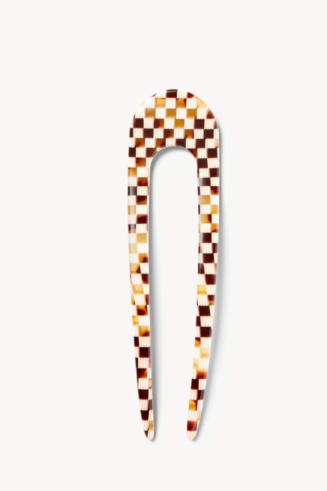 Tortoise checkered hair clip on a white background
