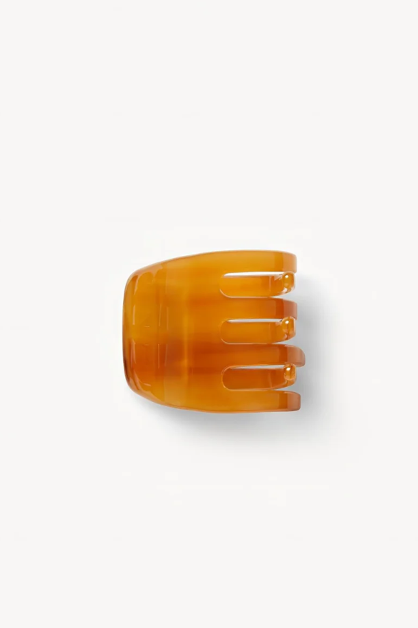 cognac hair clip or claw  on a white background
